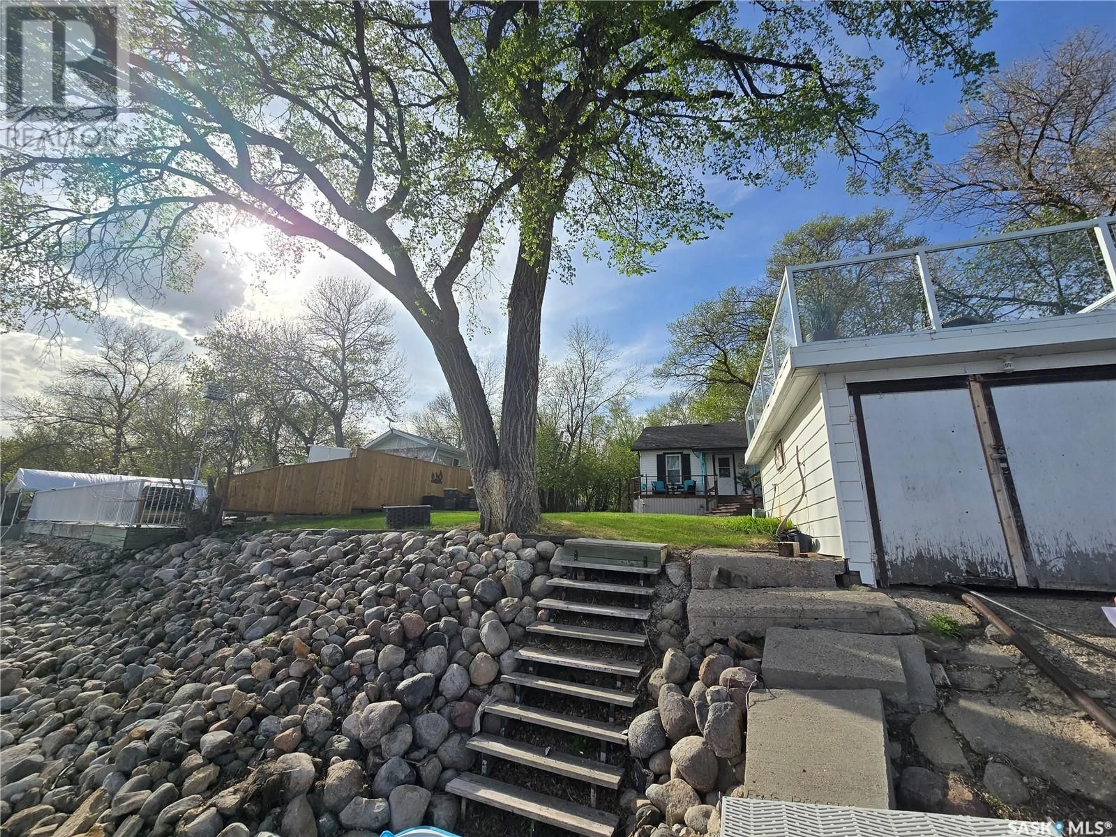 A pic from outside/outdoor area/front of a property/back of a property/a pic from drone, water/lake/river/ocean view for 82 ELK ROAD, Crooked Lake Saskatchewan S0G2B0