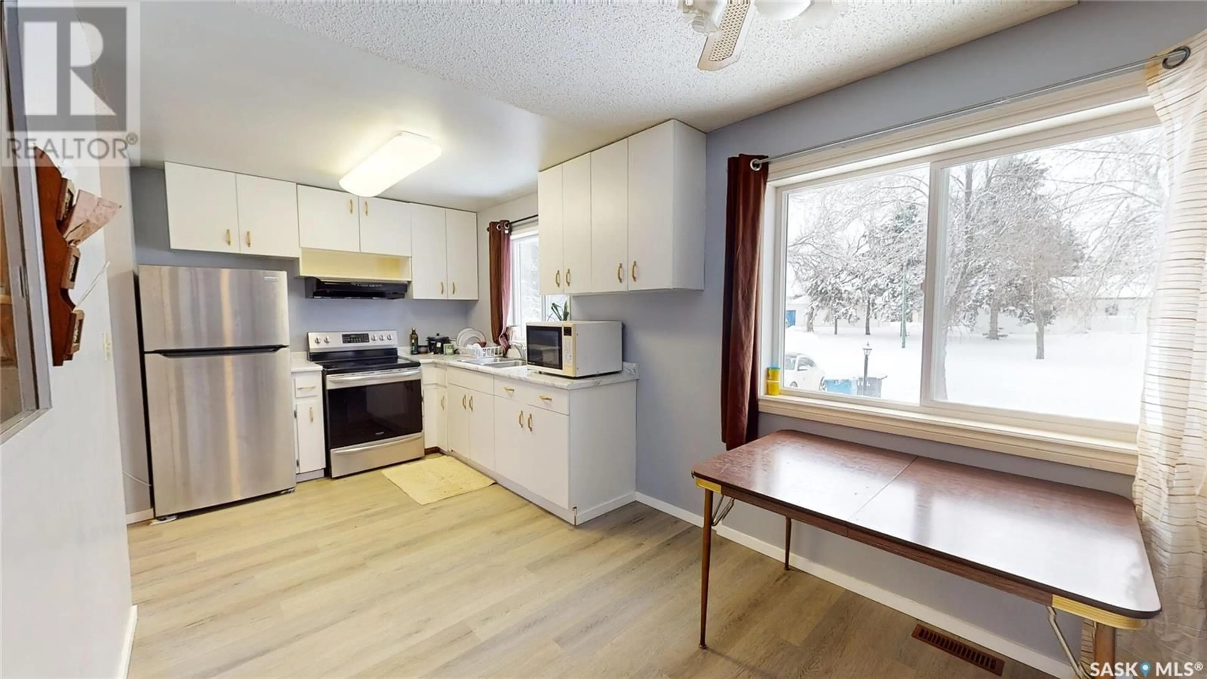 Standard kitchen, wood/laminate floor for 306 BROADWAY AVENUE, Moosomin Saskatchewan S0G3N0