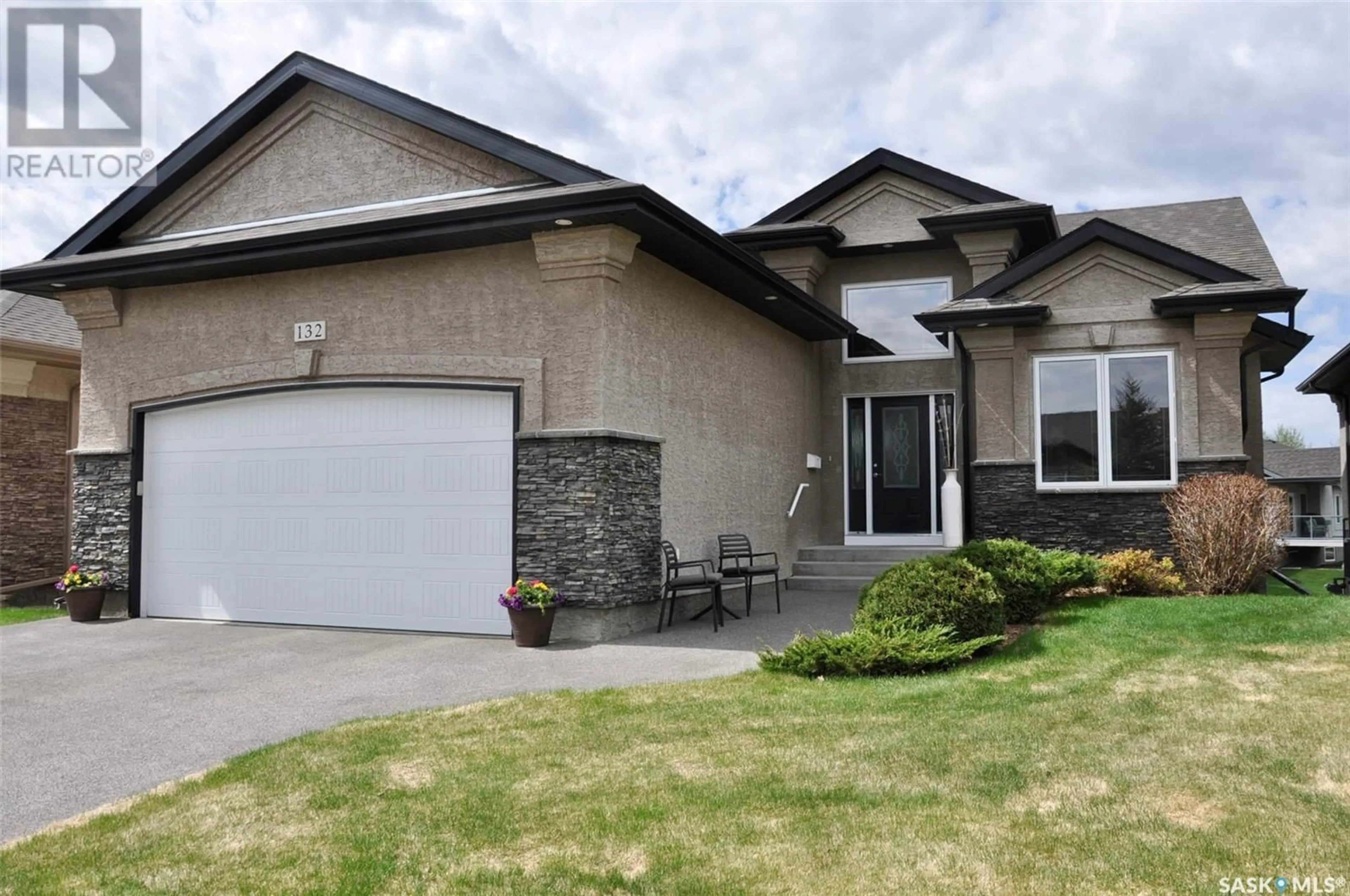 Home with vinyl exterior material, street for 132 201 CARTWRIGHT TERRACE, Saskatoon Saskatchewan S7T0A4