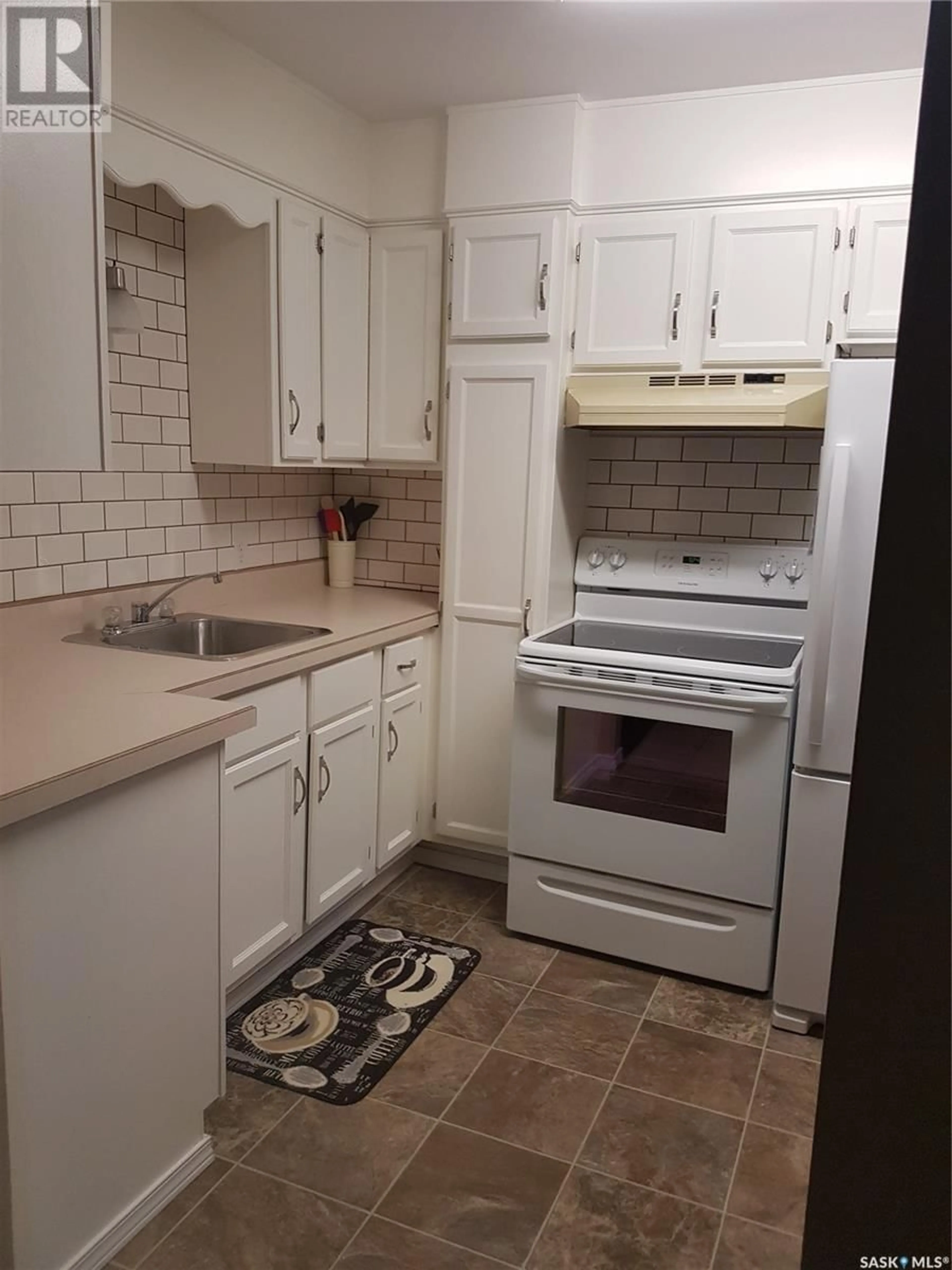 Standard kitchen, ceramic/tile floor for 319 19TH STREET, Prince Albert Saskatchewan S6V1J8