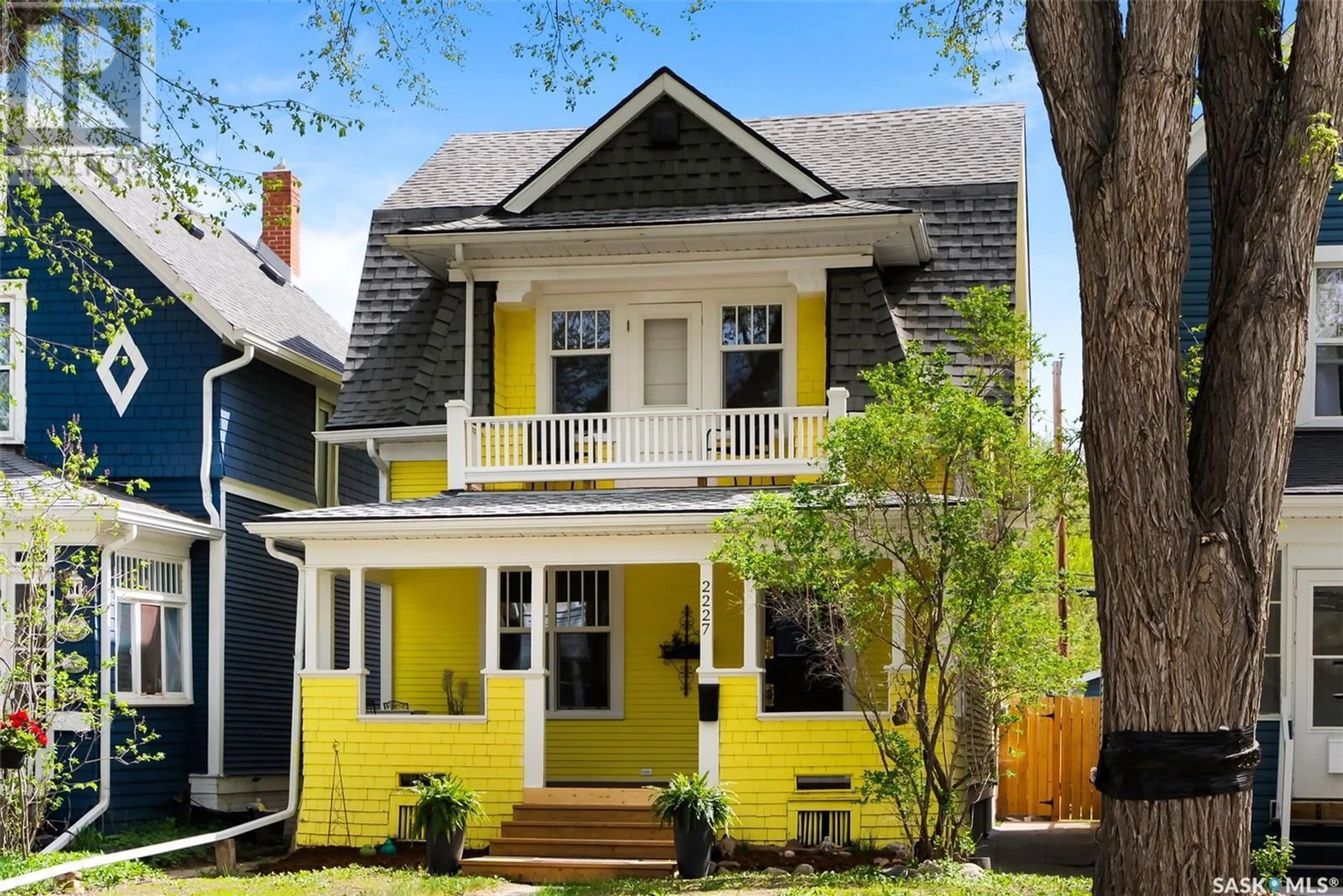 Home with vinyl exterior material, street for 2227 RAE STREET, Regina Saskatchewan S4T2G1