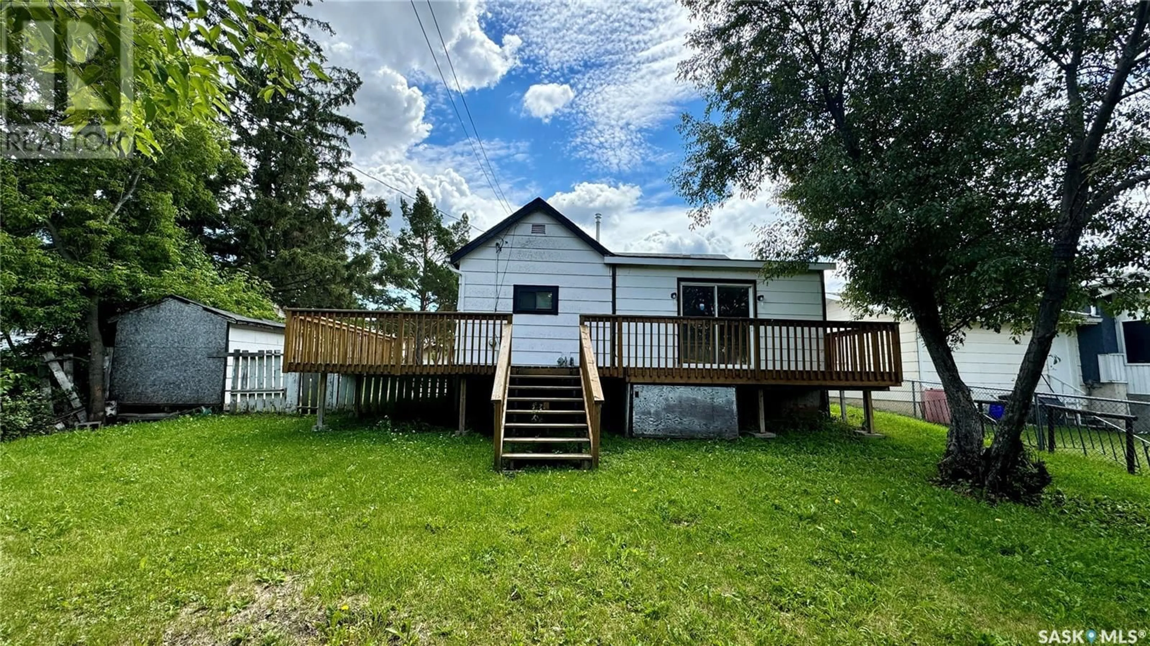 A pic from outside/outdoor area/front of a property/back of a property/a pic from drone, building for 1434 13TH STREET, Prince Albert Saskatchewan S6V3J5