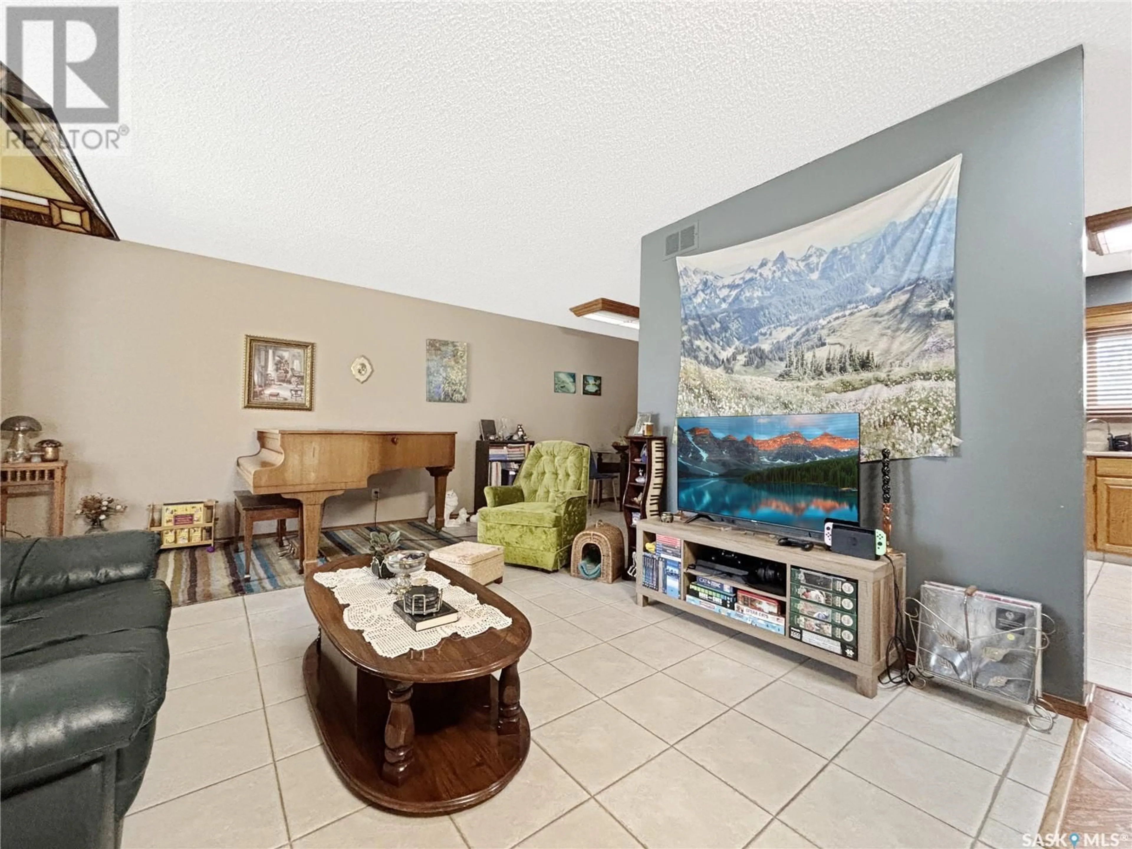 Living room with furniture, unknown for 215 HOGG WAY, Saskatoon Saskatchewan S7N3W4