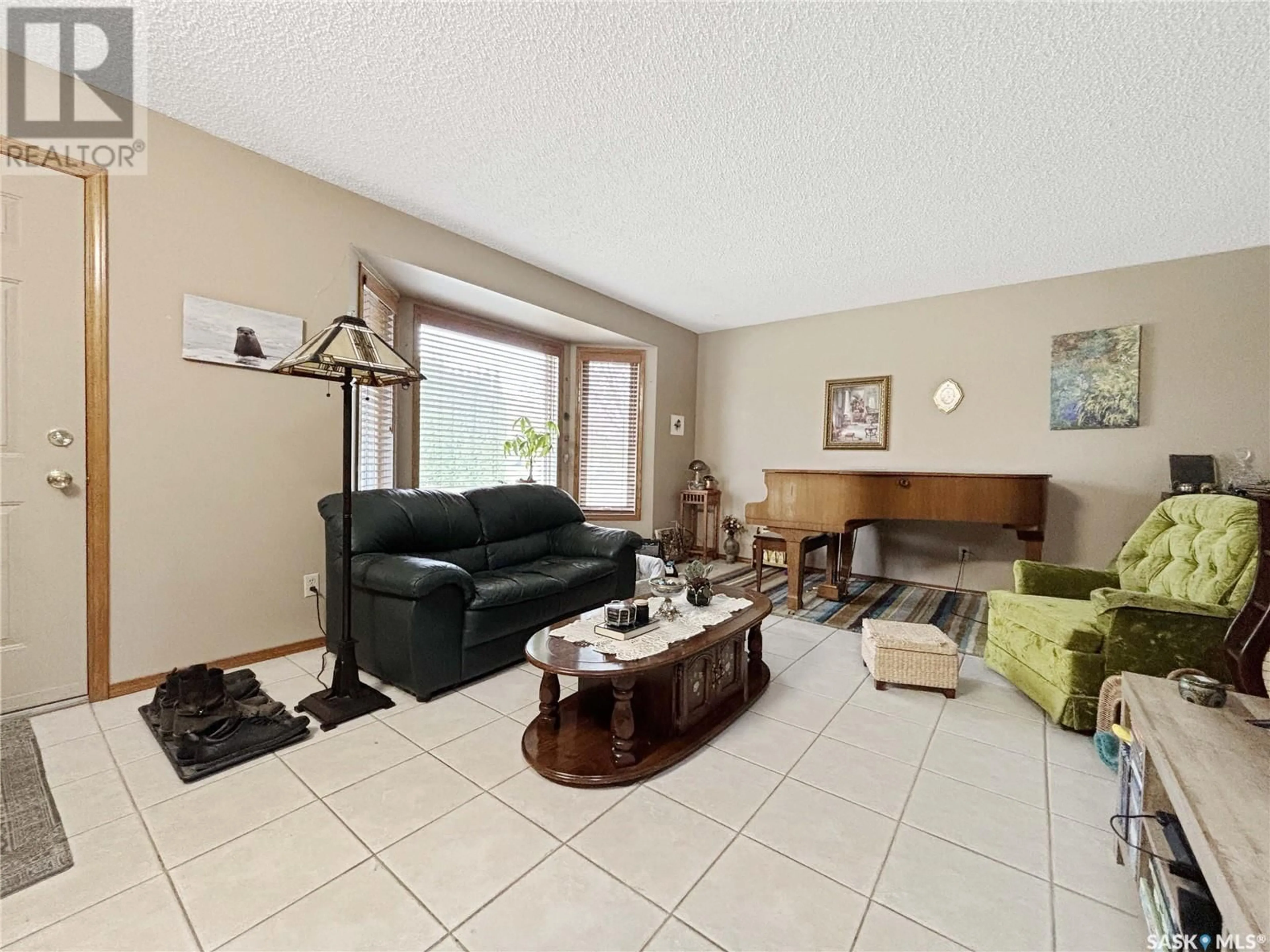 Living room with furniture, unknown for 215 HOGG WAY, Saskatoon Saskatchewan S7N3W4