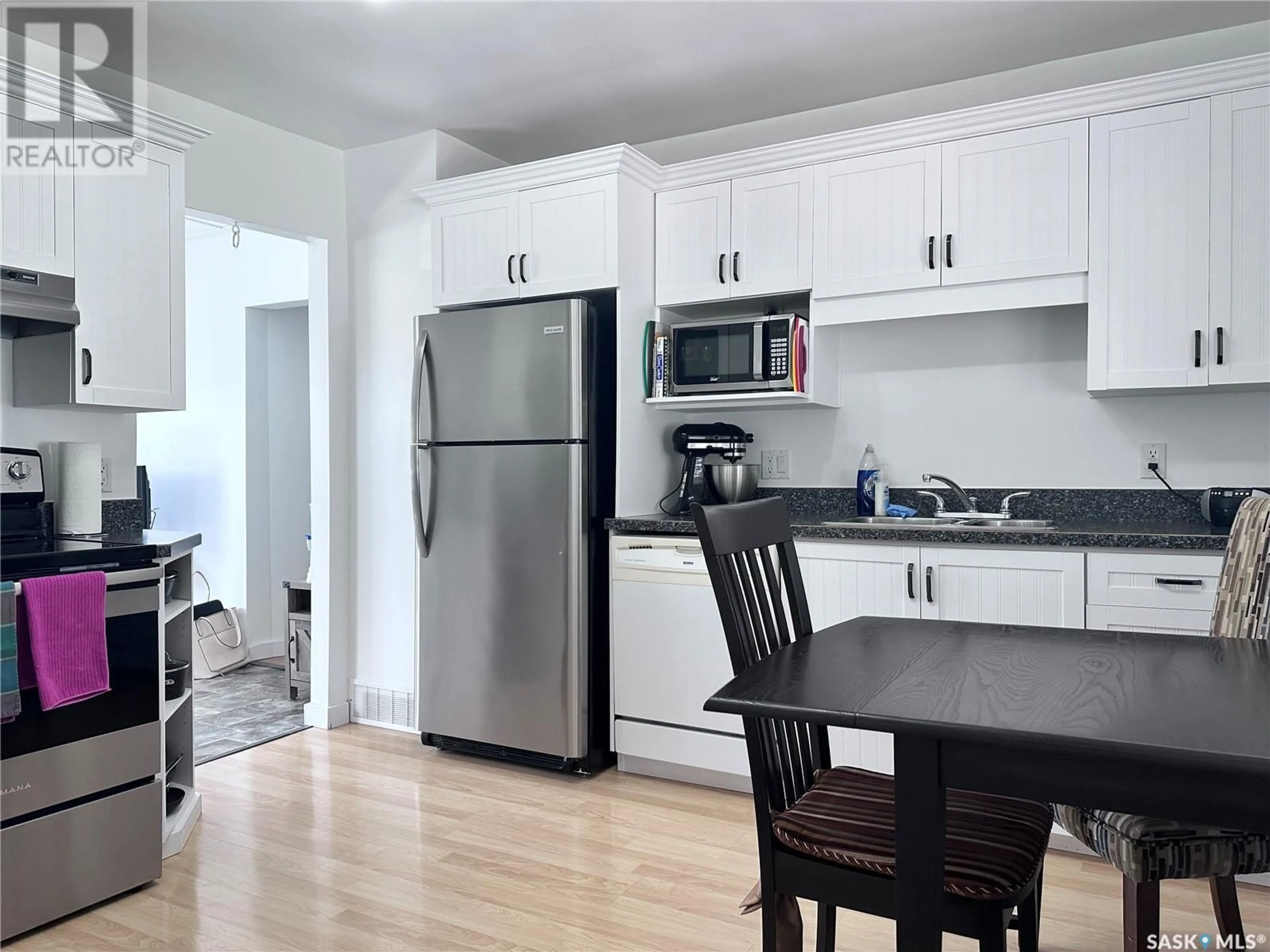 Standard kitchen, wood/laminate floor for 228 LORRAINE STREET, Weyburn Saskatchewan S4H1S1