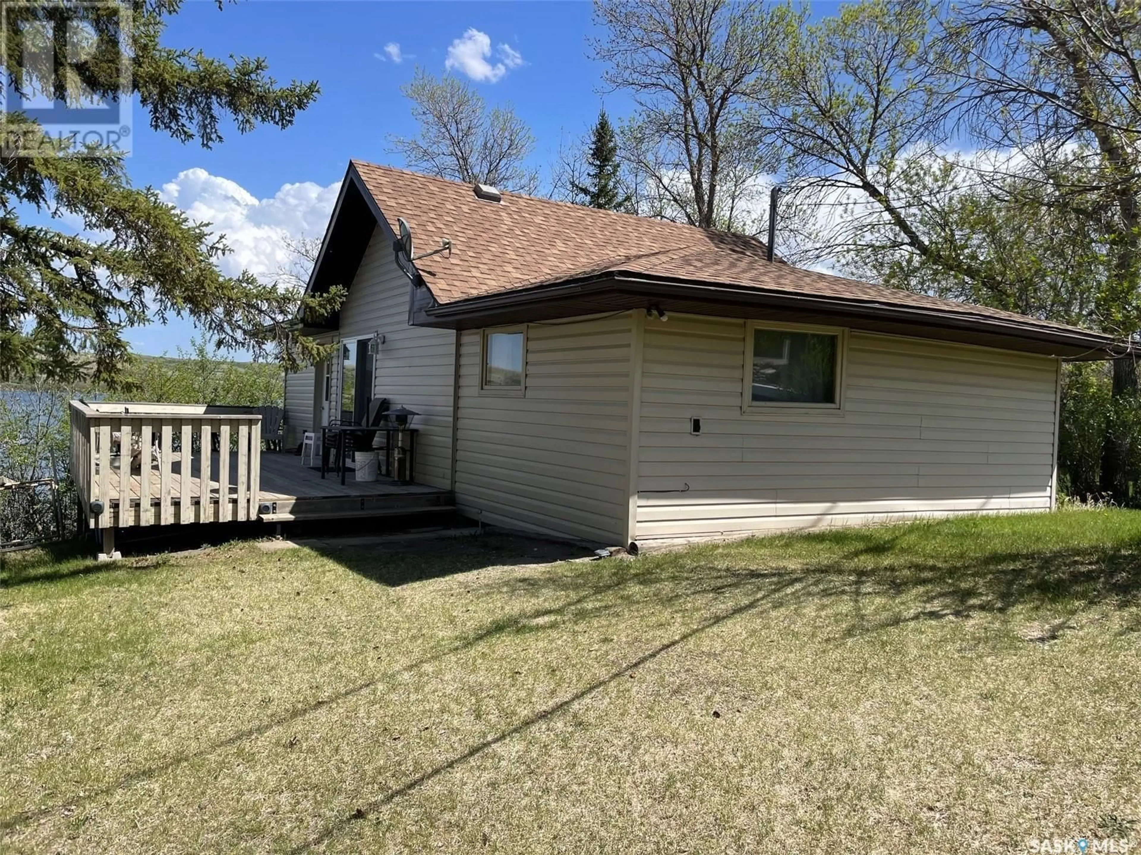 A pic from outside/outdoor area/front of a property/back of a property/a pic from drone, unknown for 1220 TATANKA DRIVE, Sun Valley Saskatchewan S0G1P0