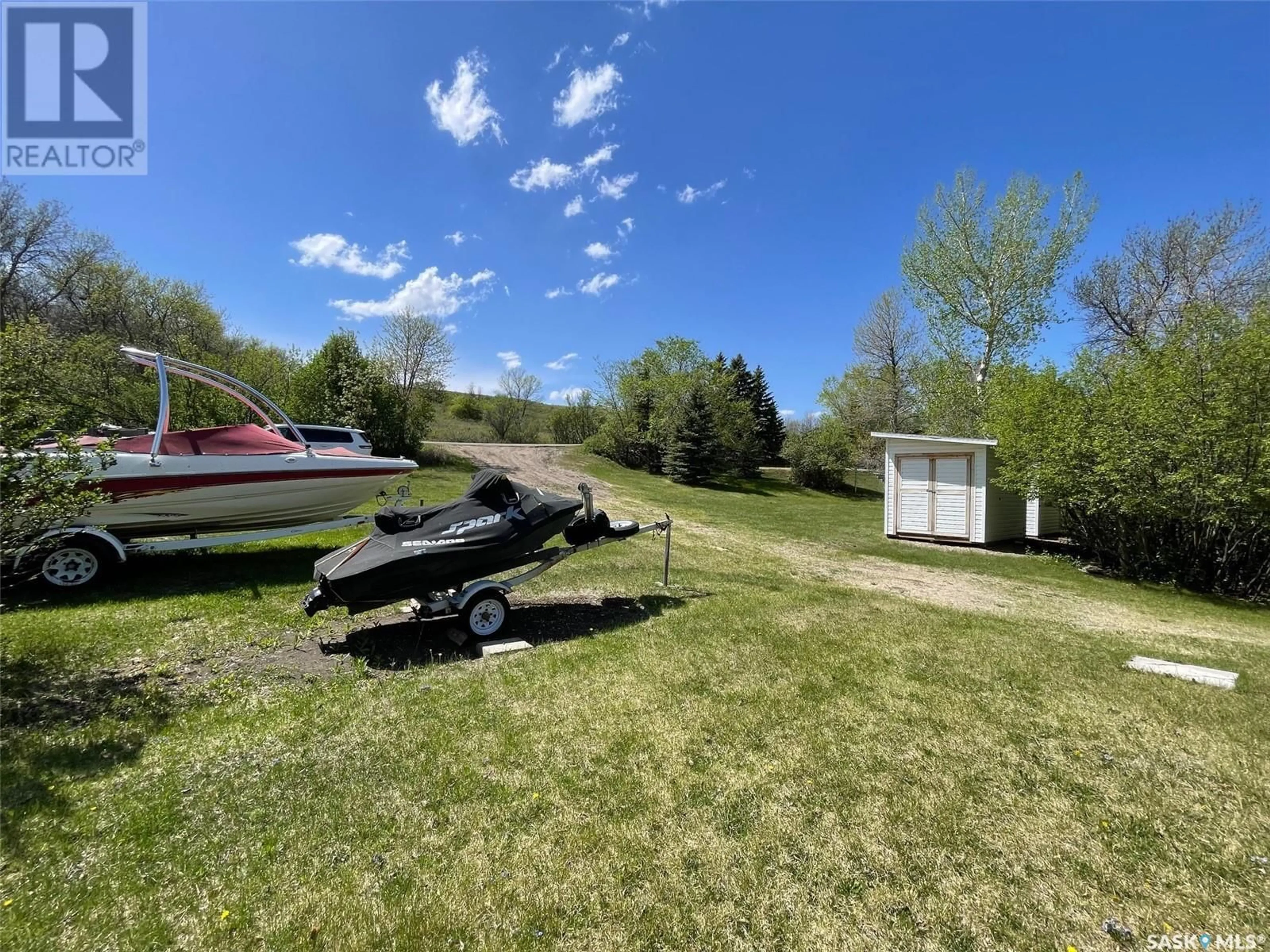 A pic from outside/outdoor area/front of a property/back of a property/a pic from drone, water/lake/river/ocean view for 1220 TATANKA DRIVE, Sun Valley Saskatchewan S0G1P0
