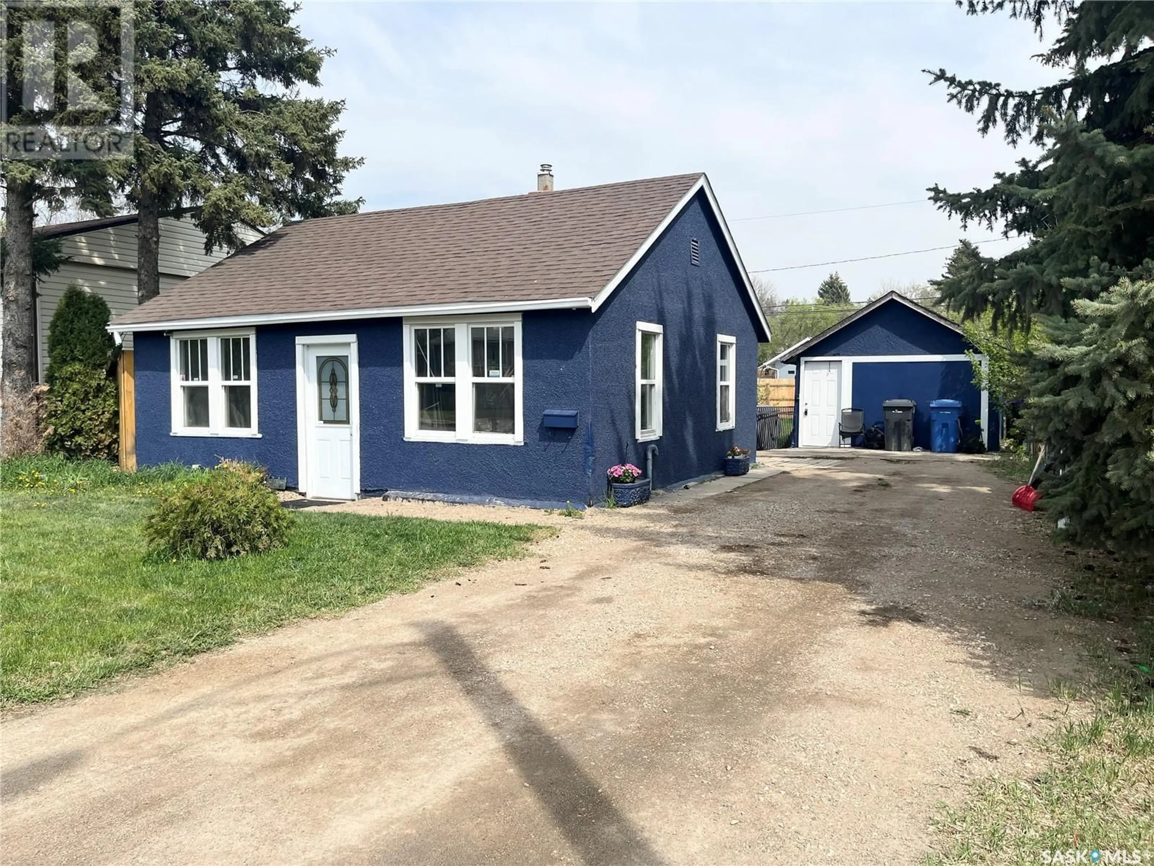 Home with vinyl exterior material, street for 1072 110TH STREET, North Battleford Saskatchewan S9A2L3