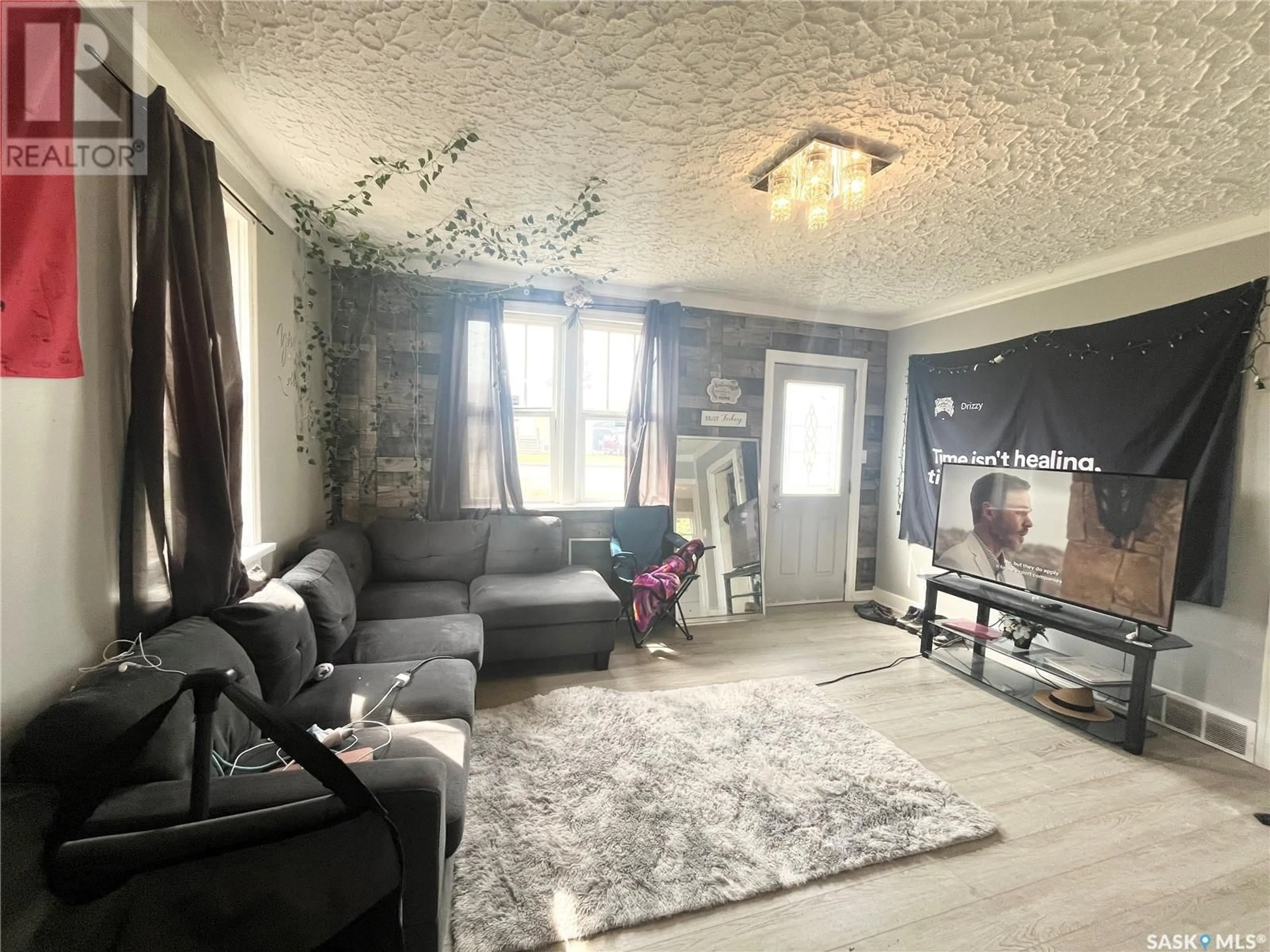 Living room with furniture, unknown for 1072 110TH STREET, North Battleford Saskatchewan S9A2L3