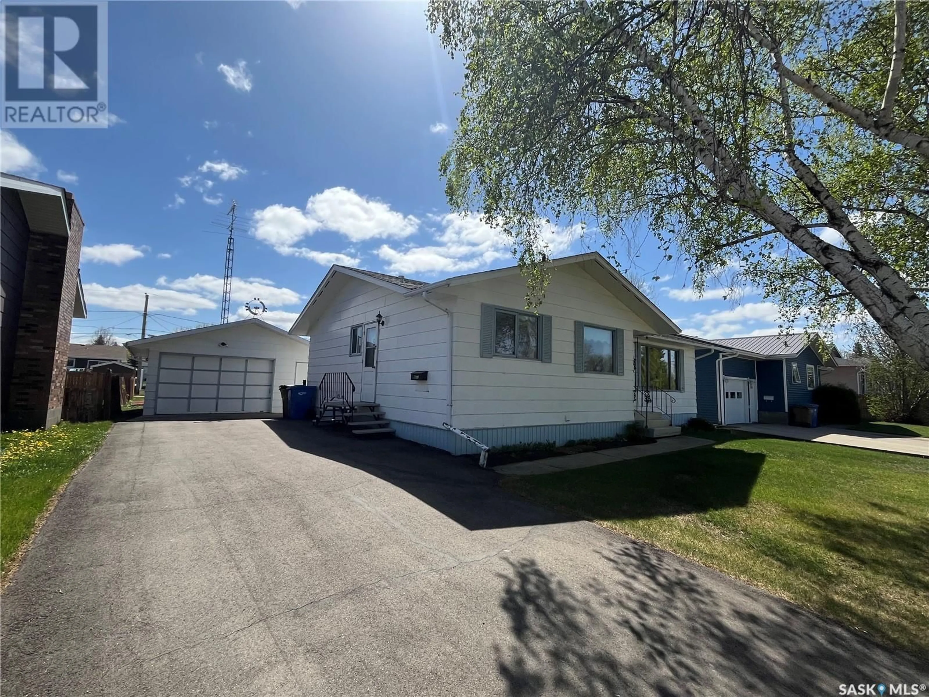 Home with vinyl exterior material, street for 113 KENNEDY DRIVE, Melfort Saskatchewan S0E1A0