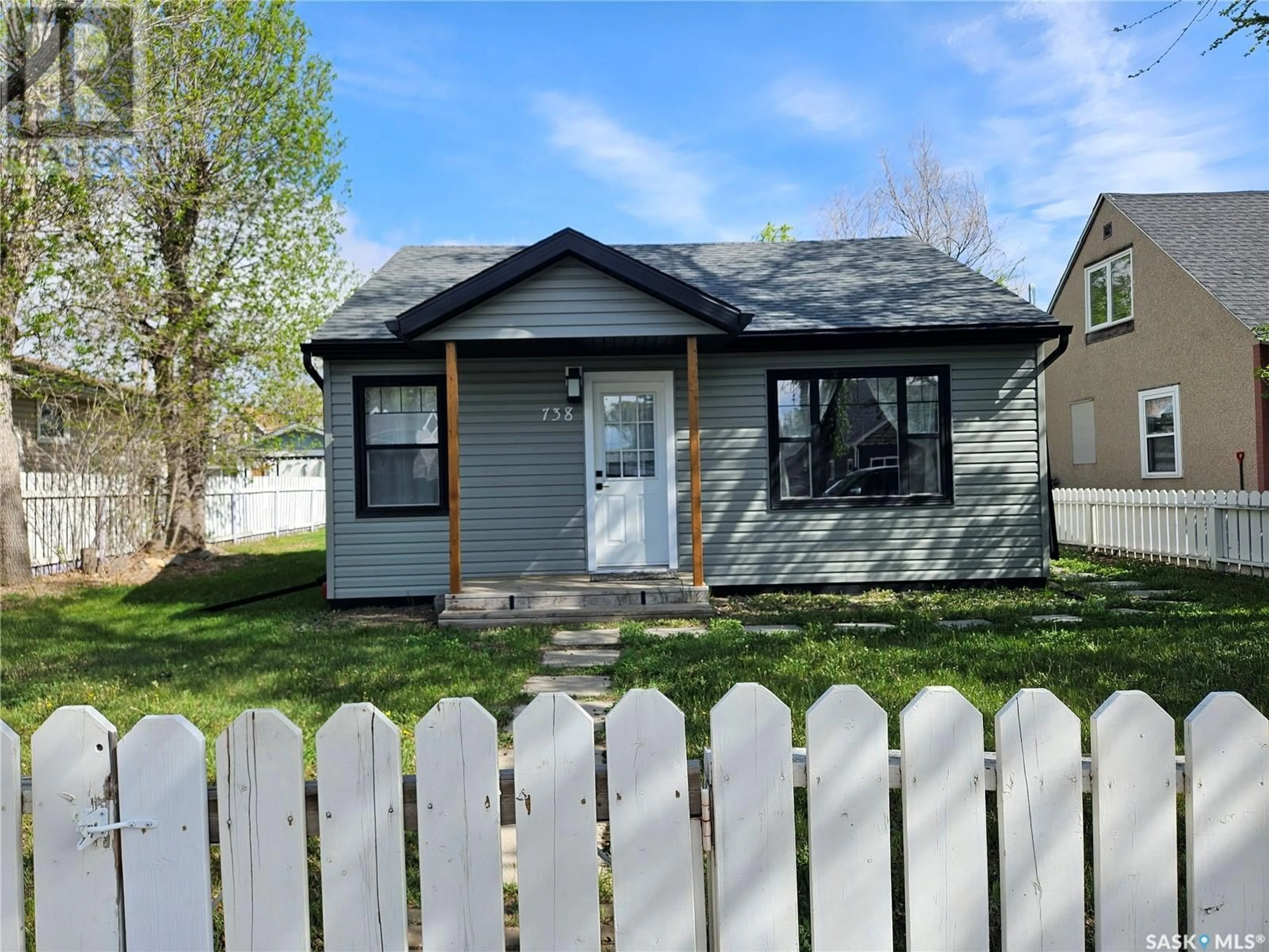 Home with vinyl exterior material, street for 738 ATHABASCA STREET, Moose Jaw Saskatchewan S6H0M5