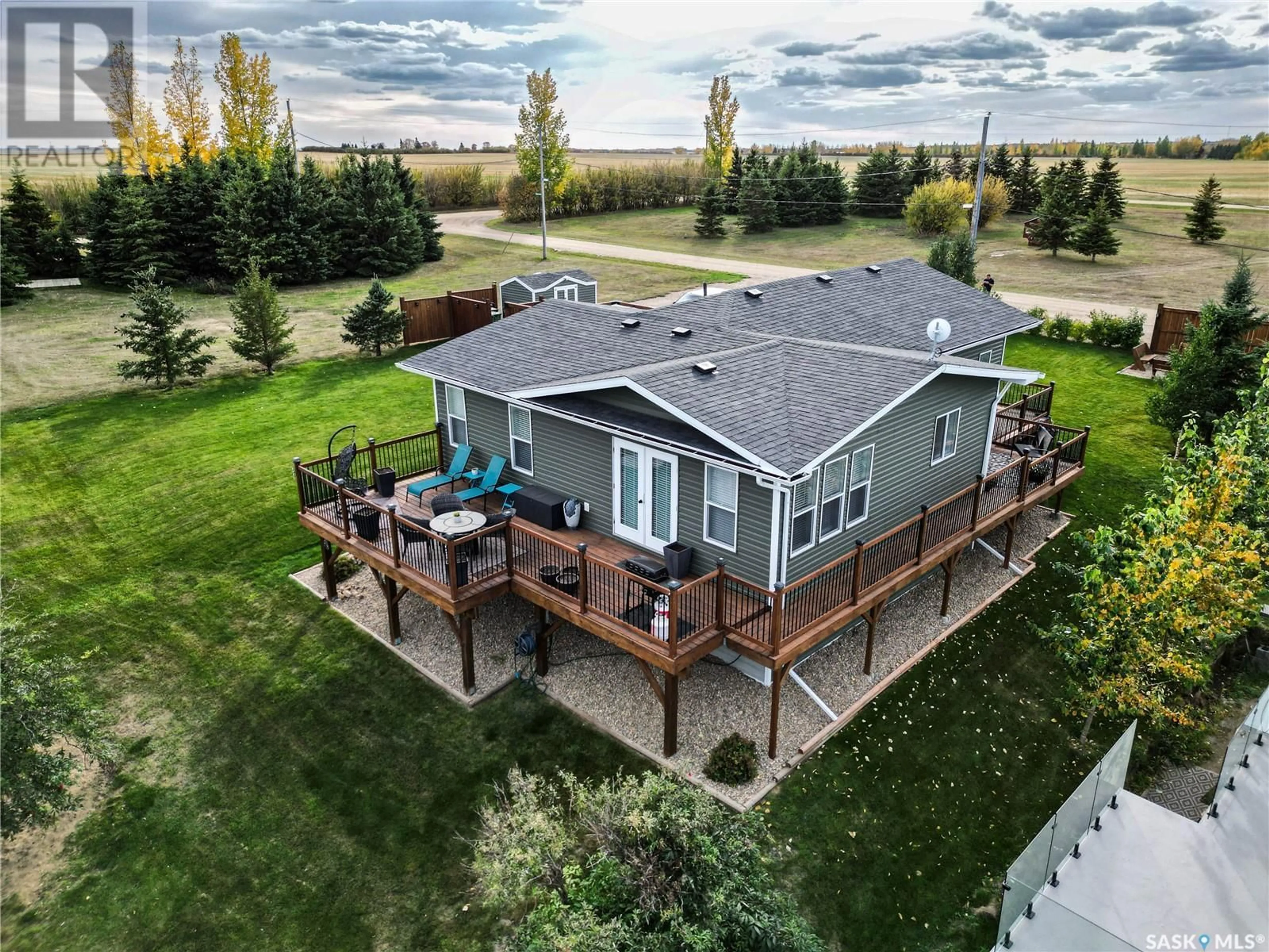 A pic from outside/outdoor area/front of a property/back of a property/a pic from drone, water/lake/river/ocean view for 708 BERTSCH PLACE, Meota Saskatchewan S0M1X0