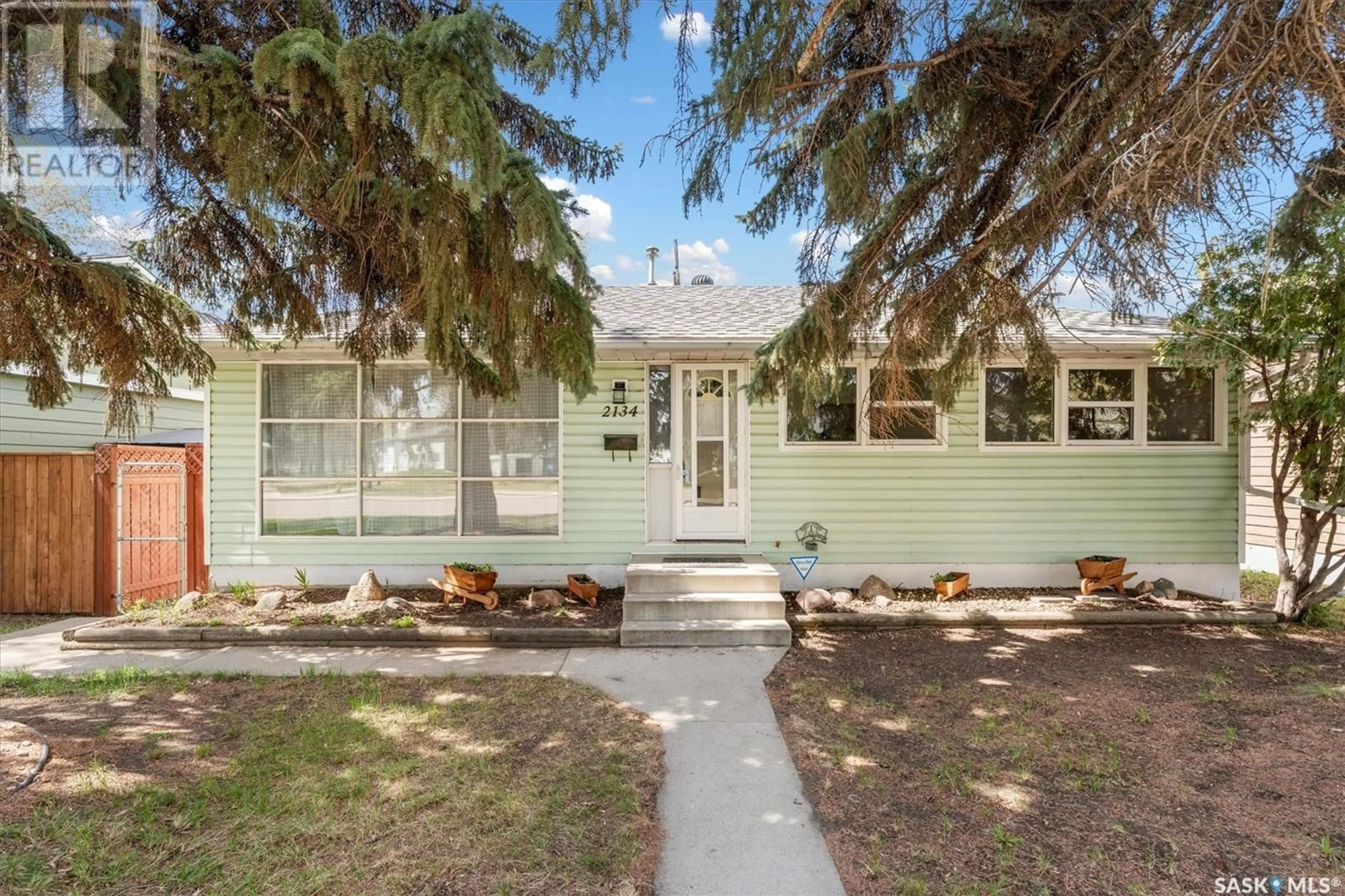 Home with vinyl exterior material, street for 2134 WILLIAM AVENUE, Saskatoon Saskatchewan S7J1A5