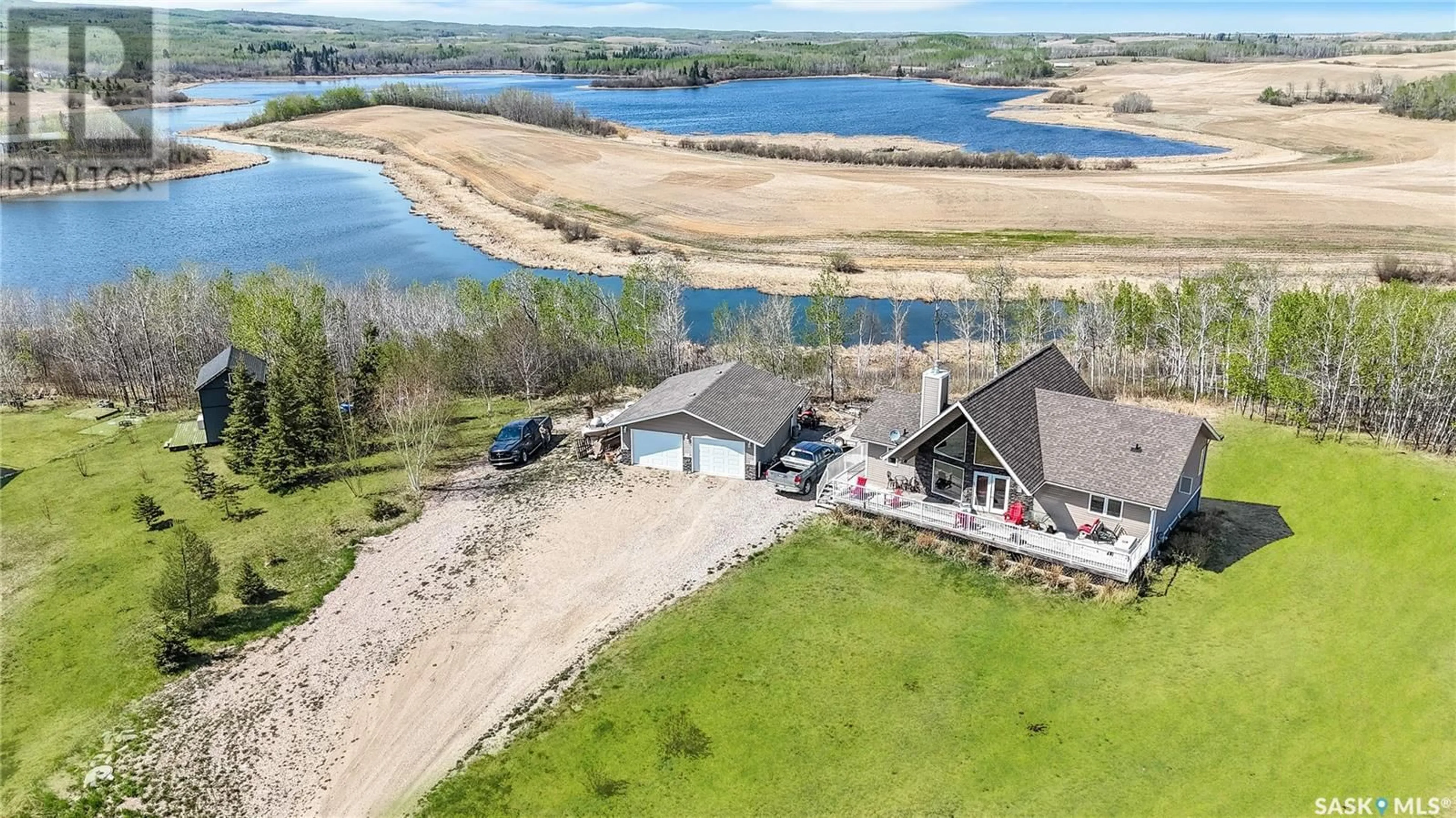 A pic from outside/outdoor area/front of a property/back of a property/a pic from drone, water/lake/river/ocean view for D'AMOUR LAKE, Leask Rm No. 464 Saskatchewan S0J1M0