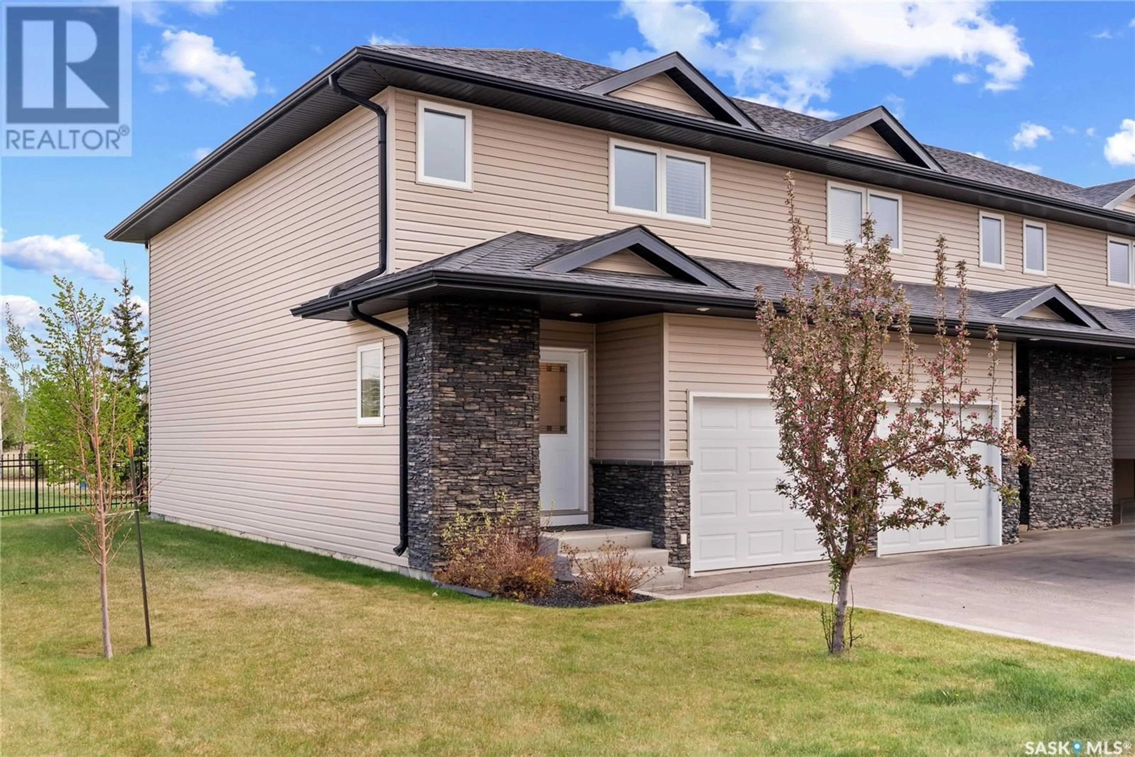 Home with brick exterior material, street for 14 365 DAWSON BAY, Saskatoon Saskatchewan S7R0L6