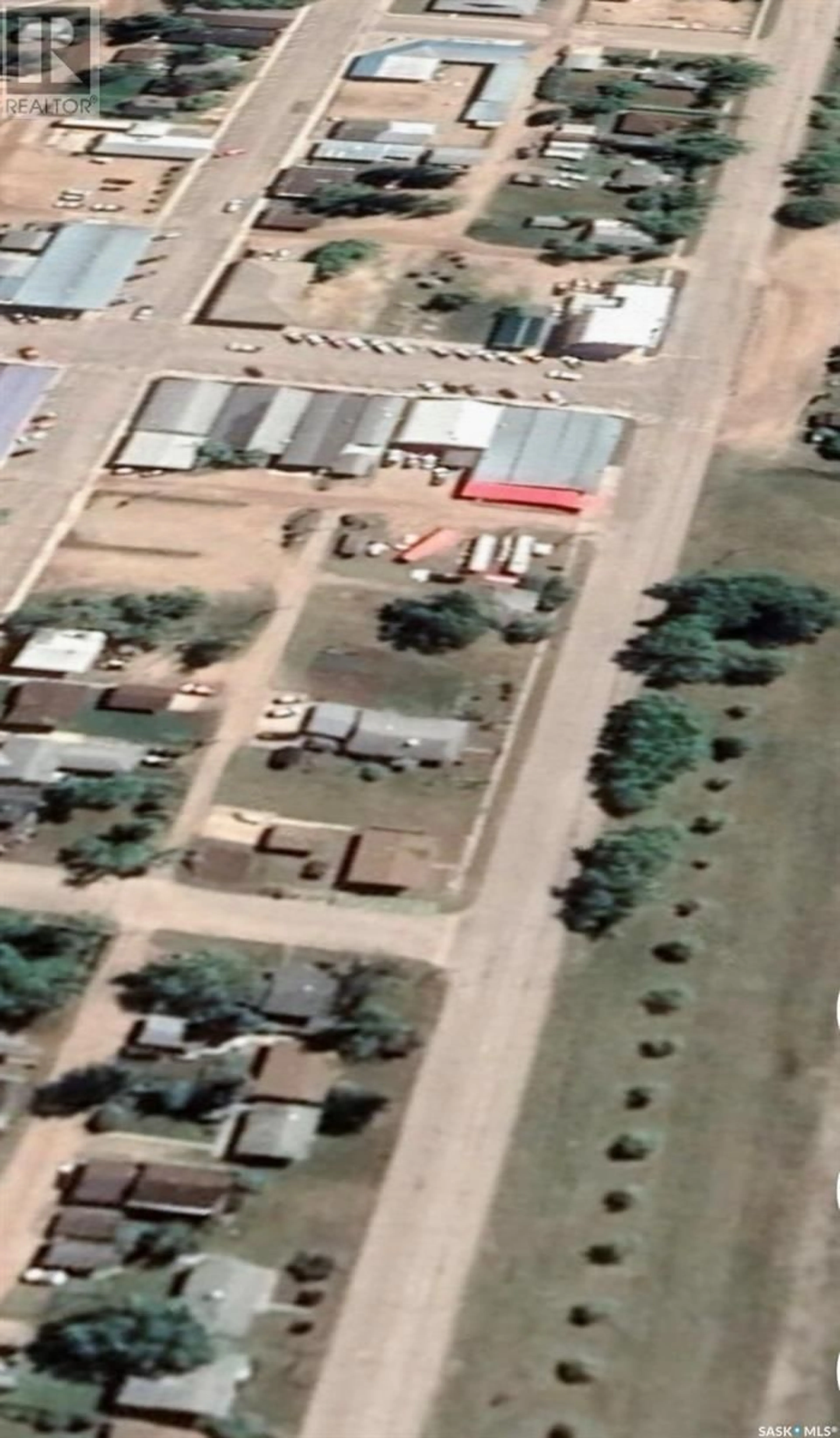 A pic from outside/outdoor area/front of a property/back of a property/a pic from drone, building for W - 28 HIGHWAY AVENUE, Preeceville Saskatchewan S0A3B0