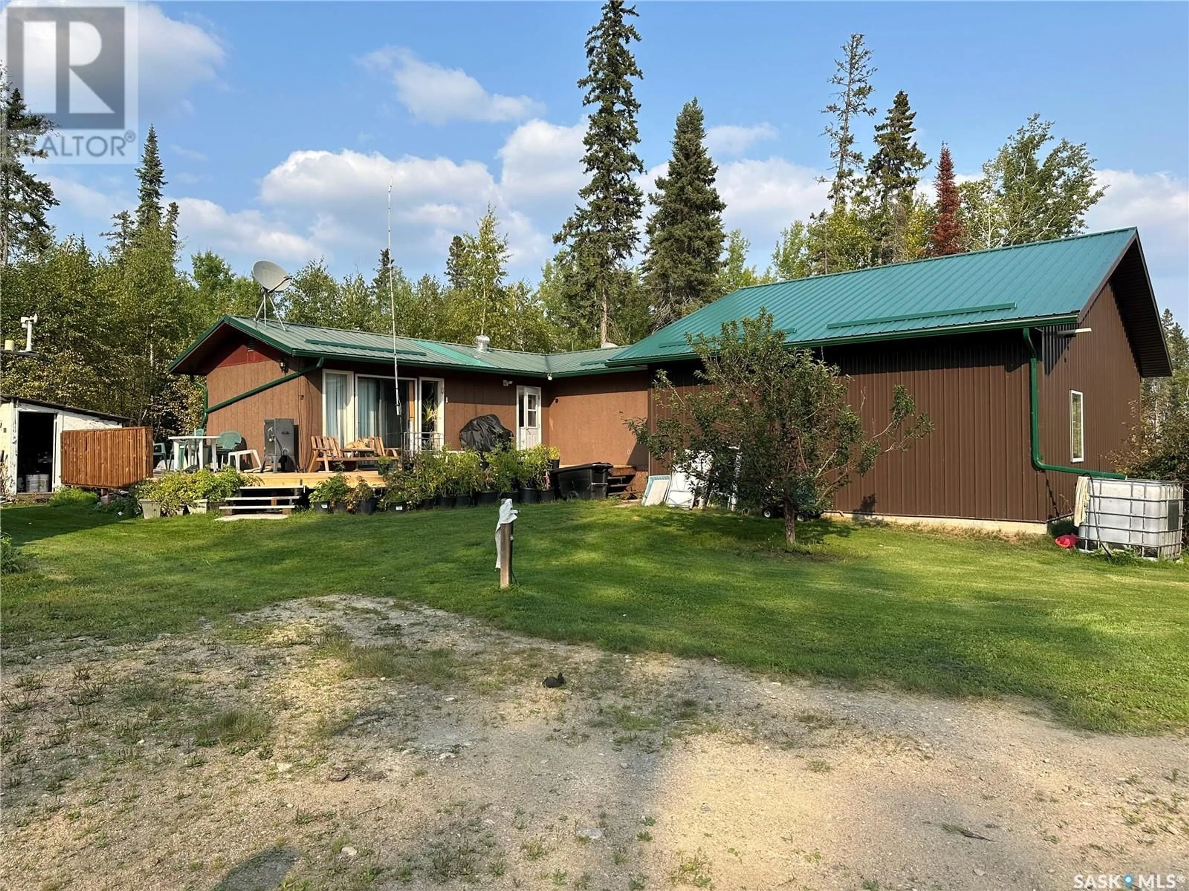A pic from outside/outdoor area/front of a property/back of a property/a pic from drone, unknown for 409 & 509 MOGWA CRESCENT, Northern Admin District Saskatchewan S0J1L0