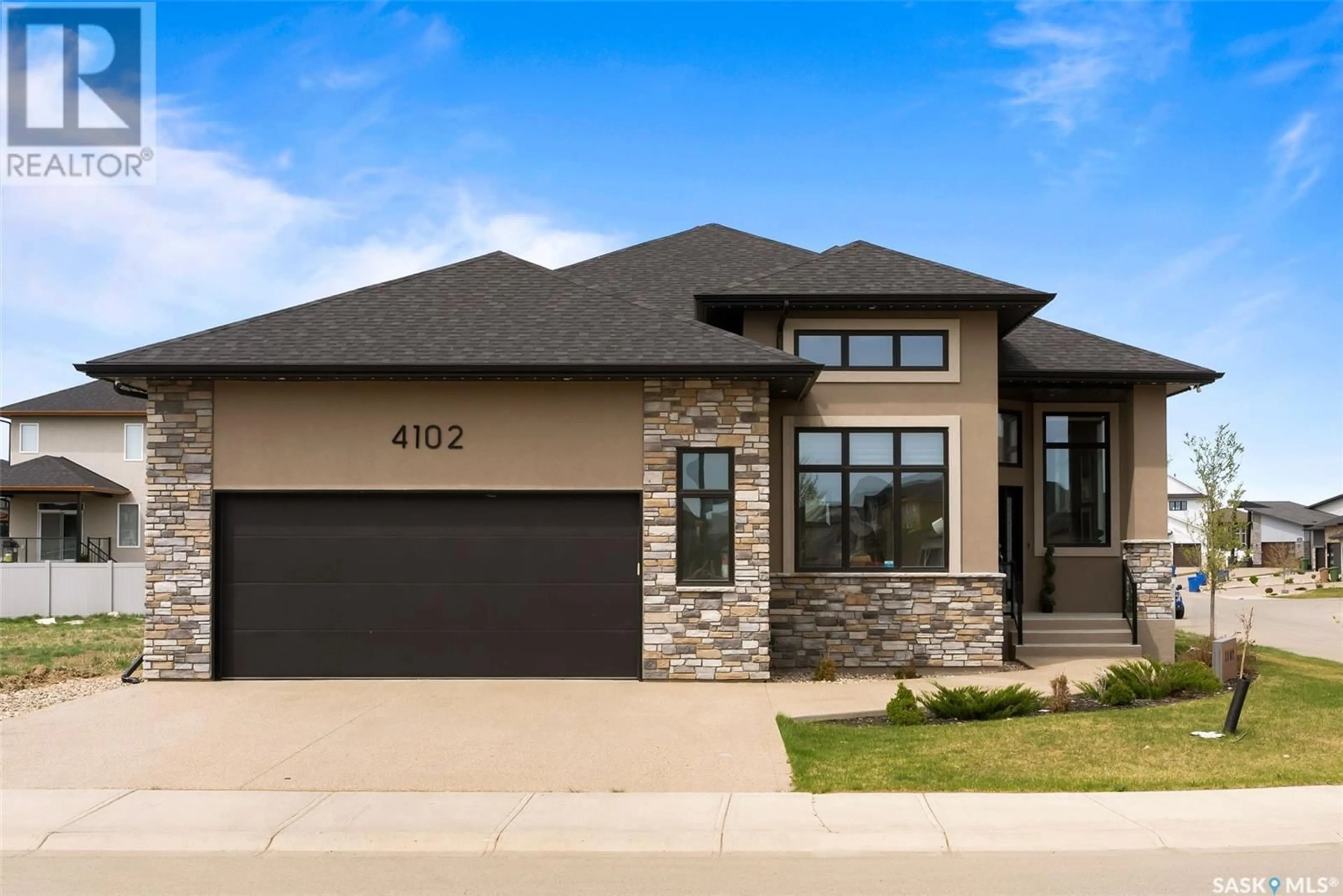 Home with brick exterior material, street for 4102 FIELDSTONE WAY, Regina Saskatchewan S4V3V3
