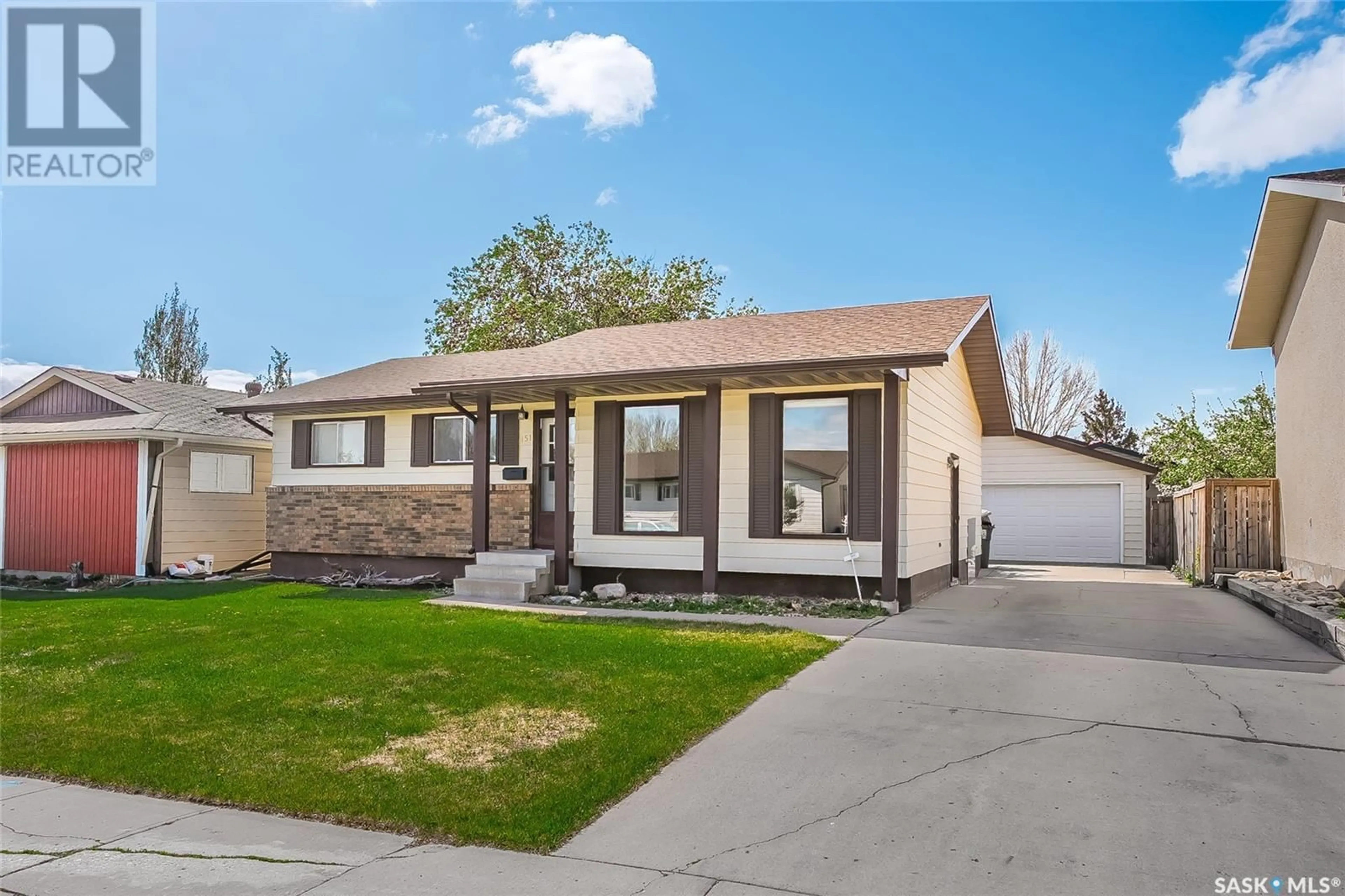 Home with vinyl exterior material, street for 151 NESBITT CRESCENT, Saskatoon Saskatchewan S7L5G6