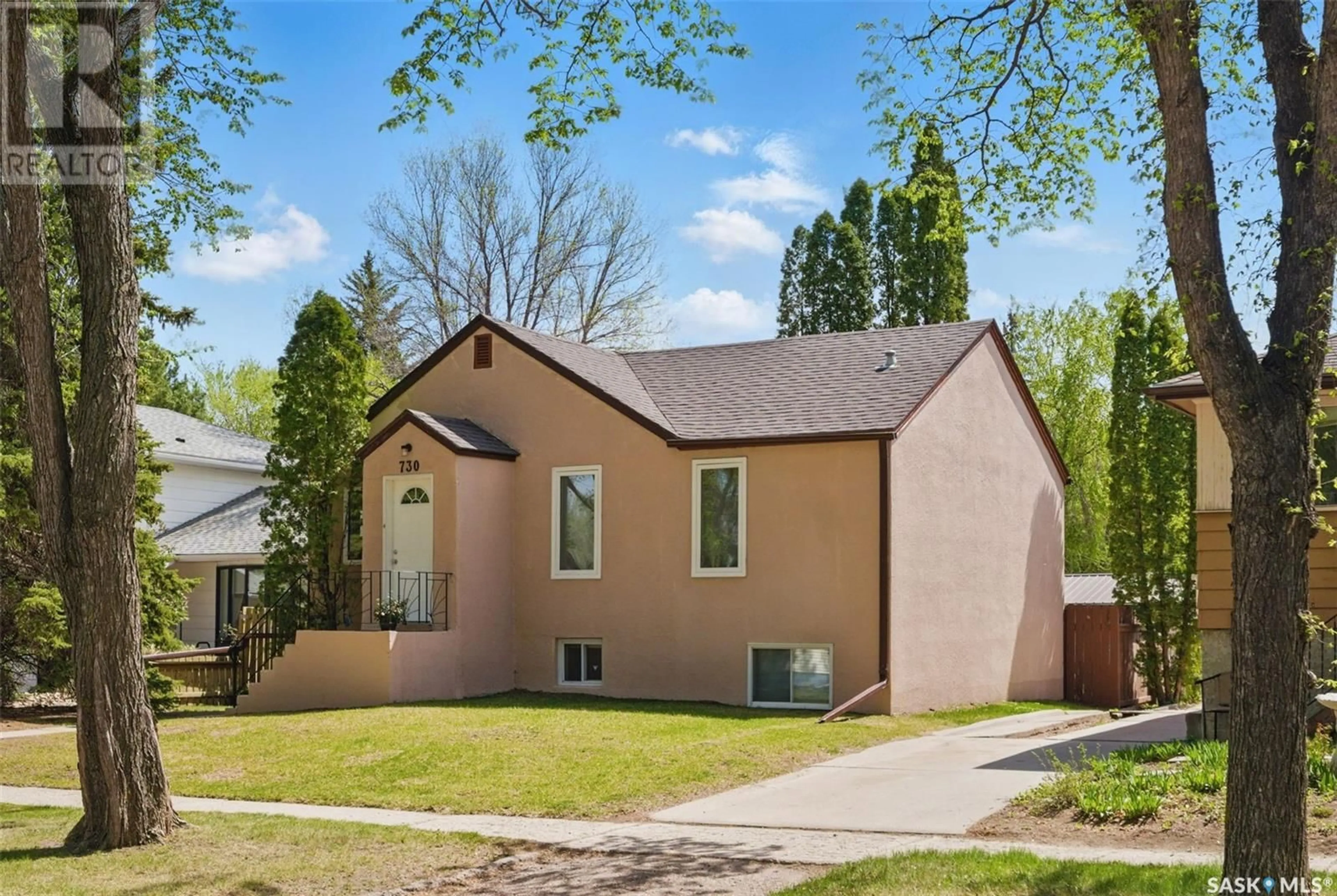 Home with vinyl exterior material, street for 730 6TH STREET, Saskatoon Saskatchewan S7H1C4