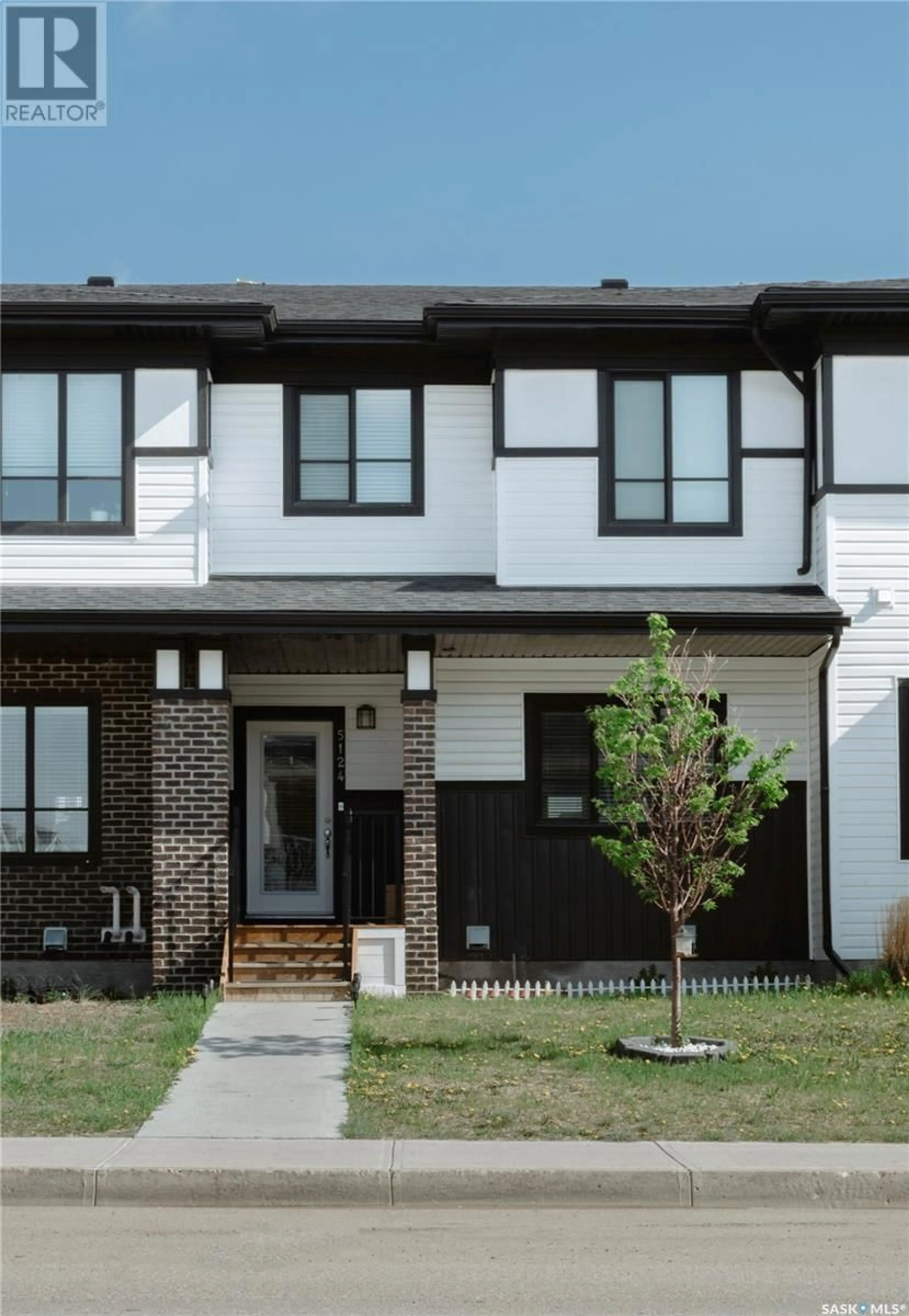 Home with brick exterior material, street for E - 5124 PRIMROSE GREEN DRIVE, Regina Saskatchewan S4V3S5