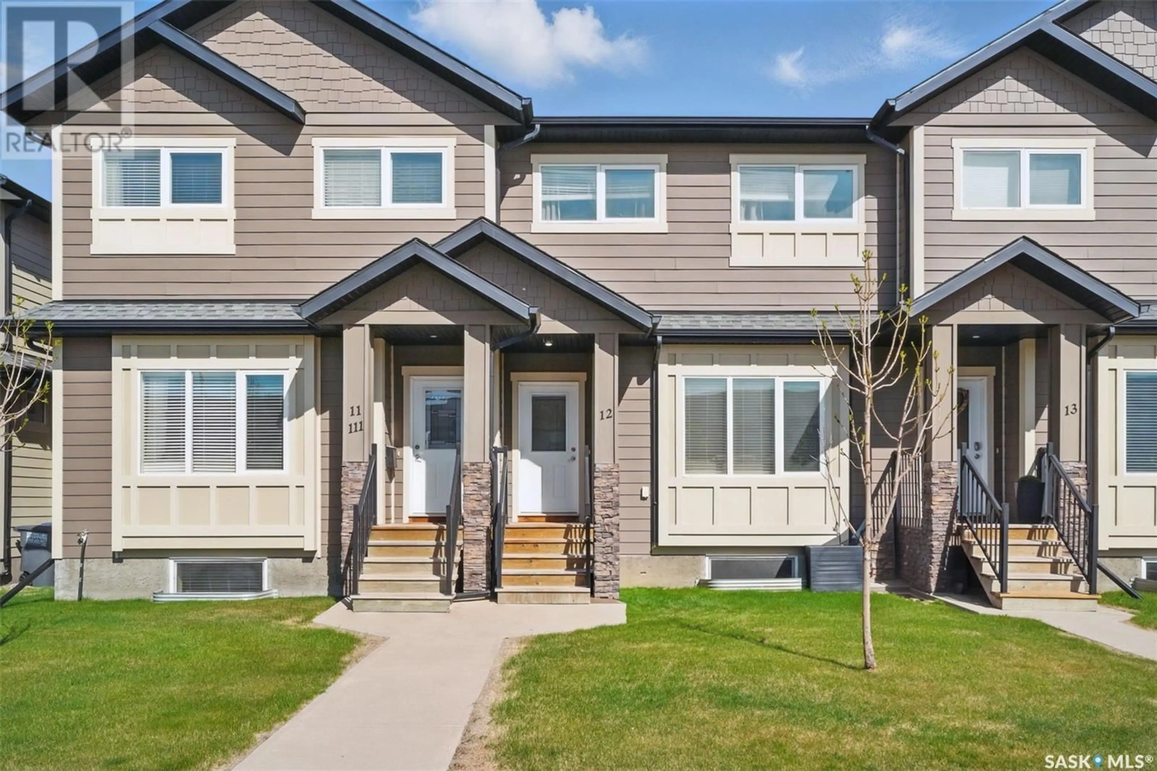 Home with vinyl exterior material, street for 111 - 12 ROSEWOOD GATE, Saskatoon Saskatchewan S7V0E5