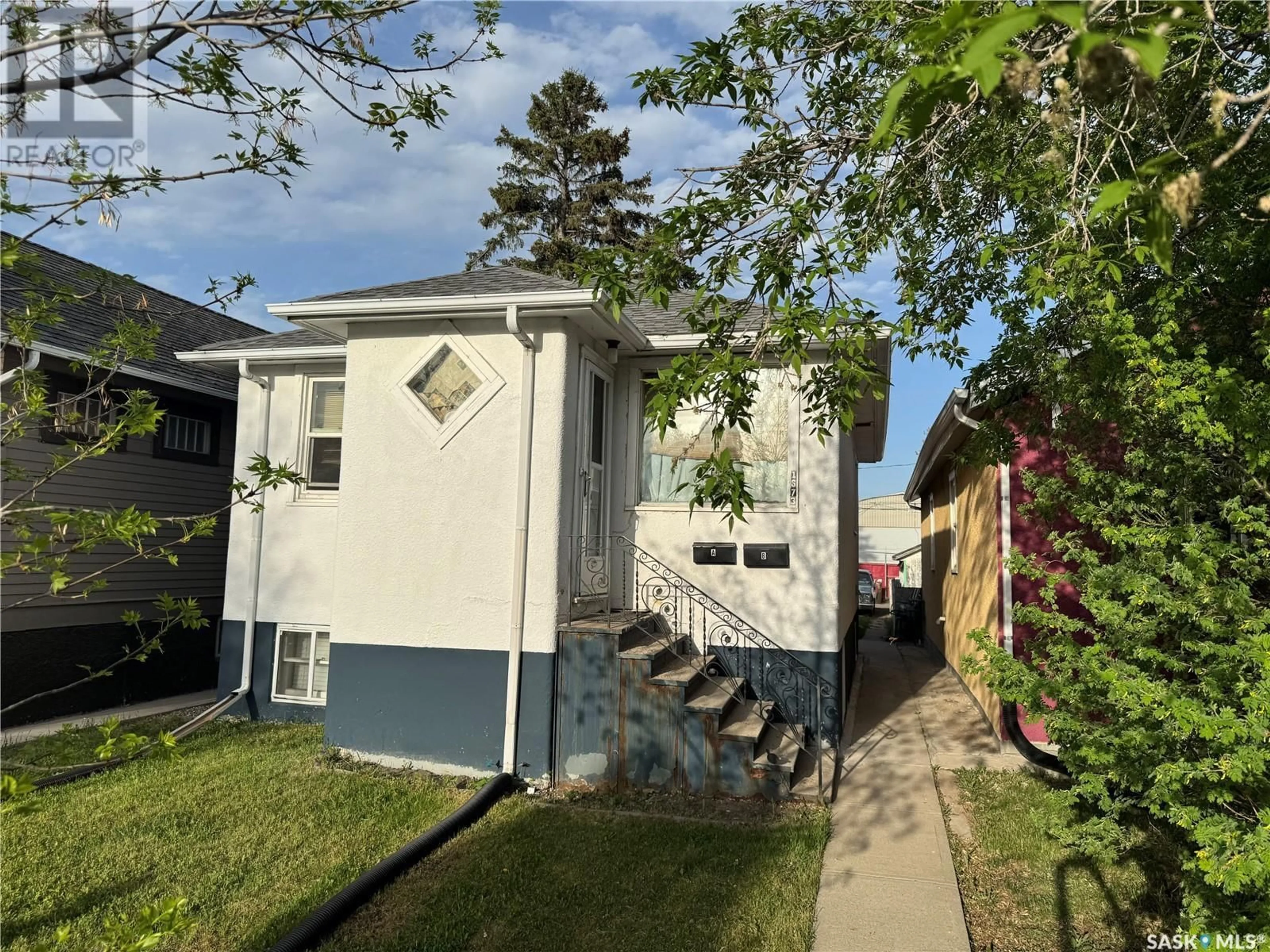 A pic from outside/outdoor area/front of a property/back of a property/a pic from drone, street for 1873 BRODER STREET, Regina Saskatchewan S4N3R7