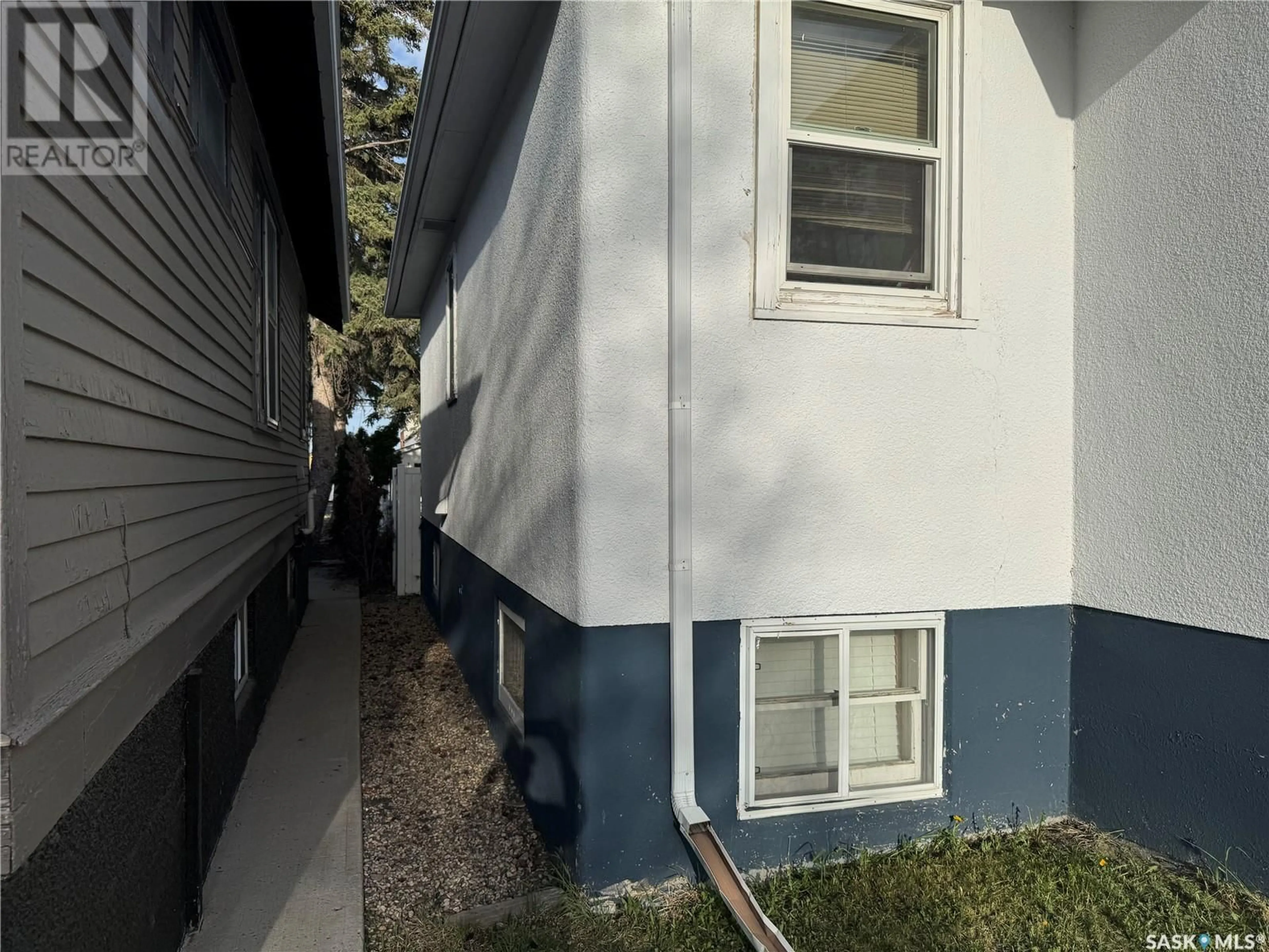 Home with vinyl exterior material, street for 1873 BRODER STREET, Regina Saskatchewan S4N3R7