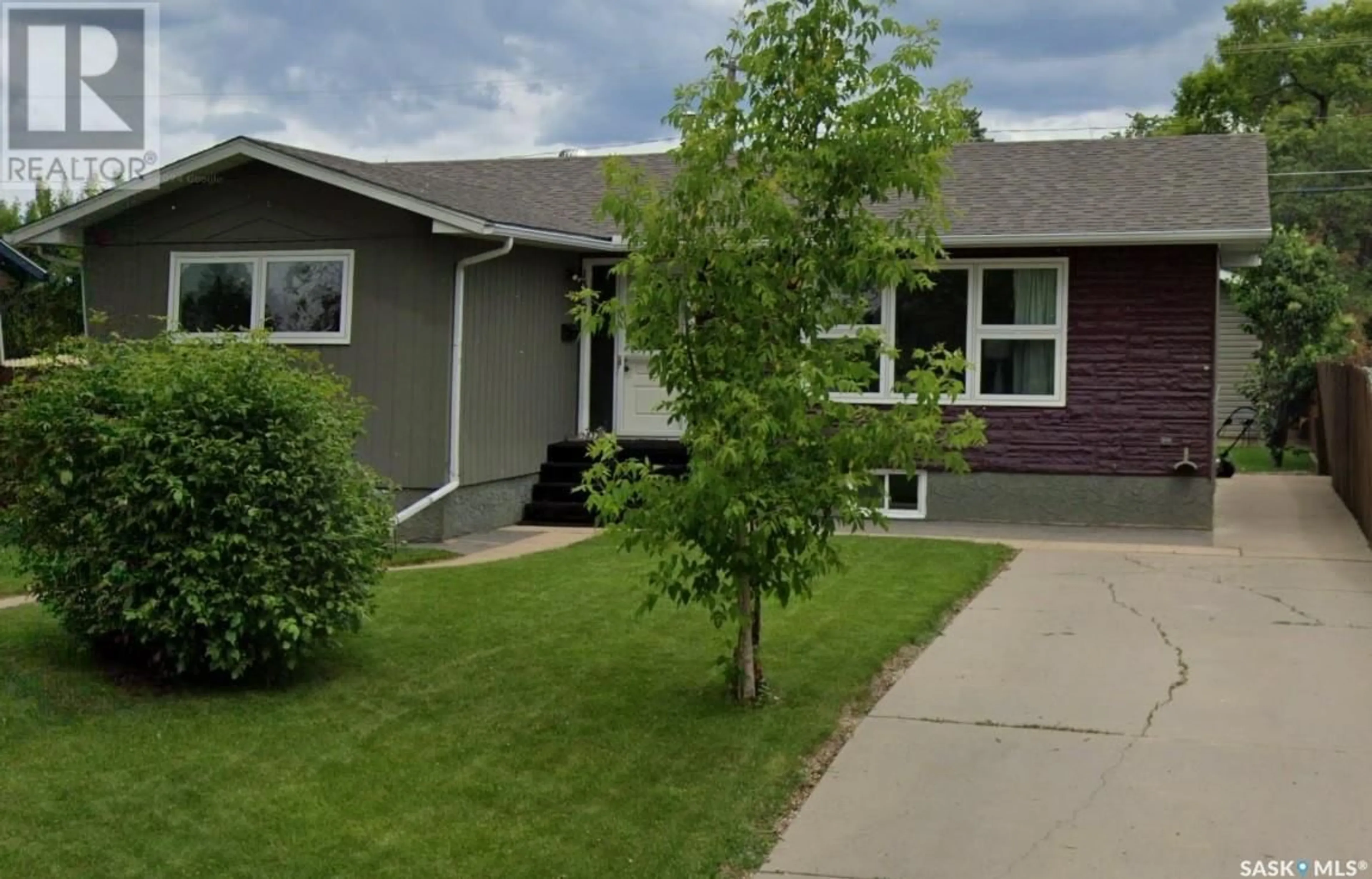 Home with vinyl exterior material, street for 1310 1ST STREET, Prince Albert Saskatchewan S6V0E3