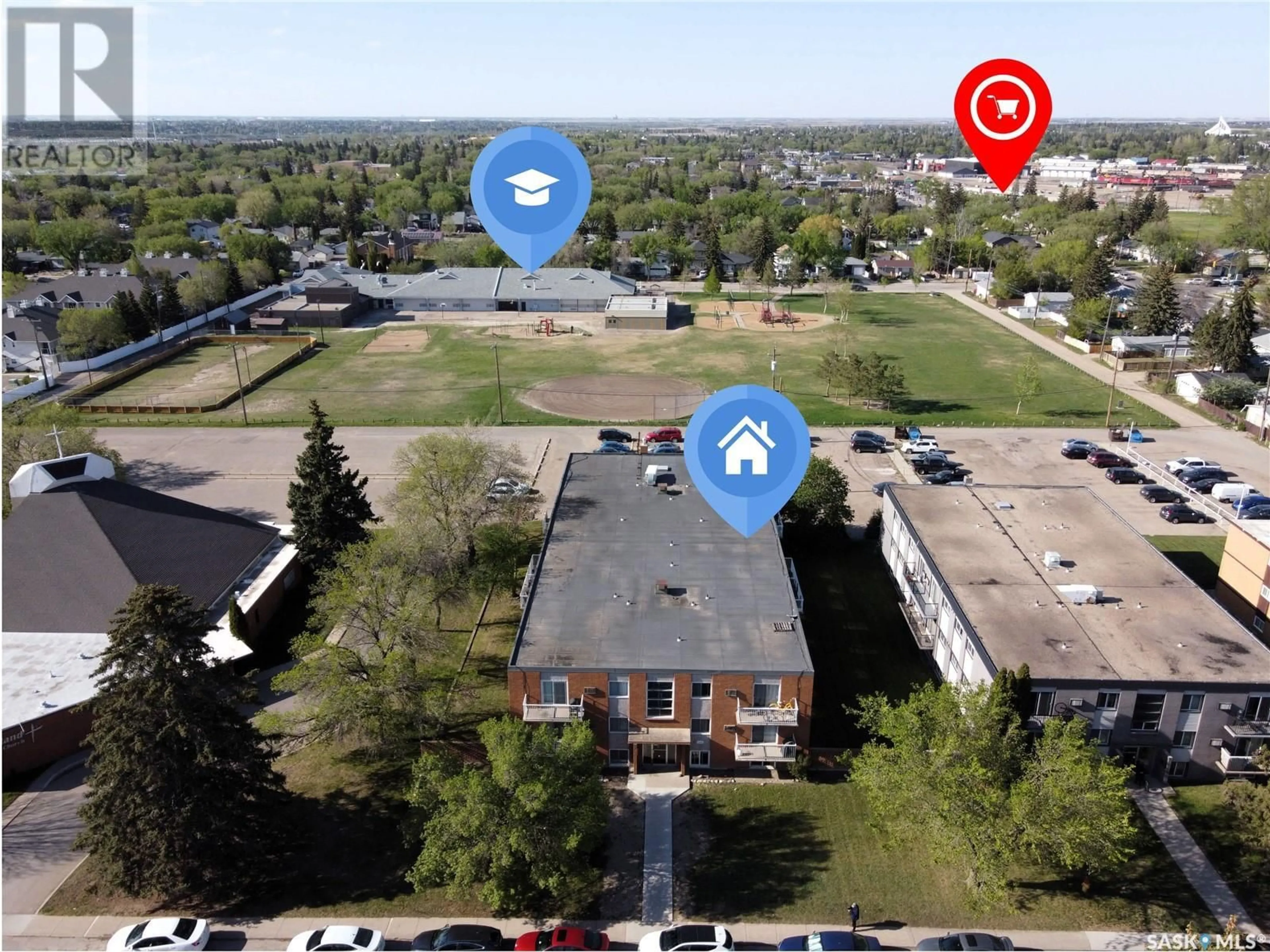 A pic from outside/outdoor area/front of a property/back of a property/a pic from drone, street for 27 106 104TH STREET, Saskatoon Saskatchewan S7N1M8