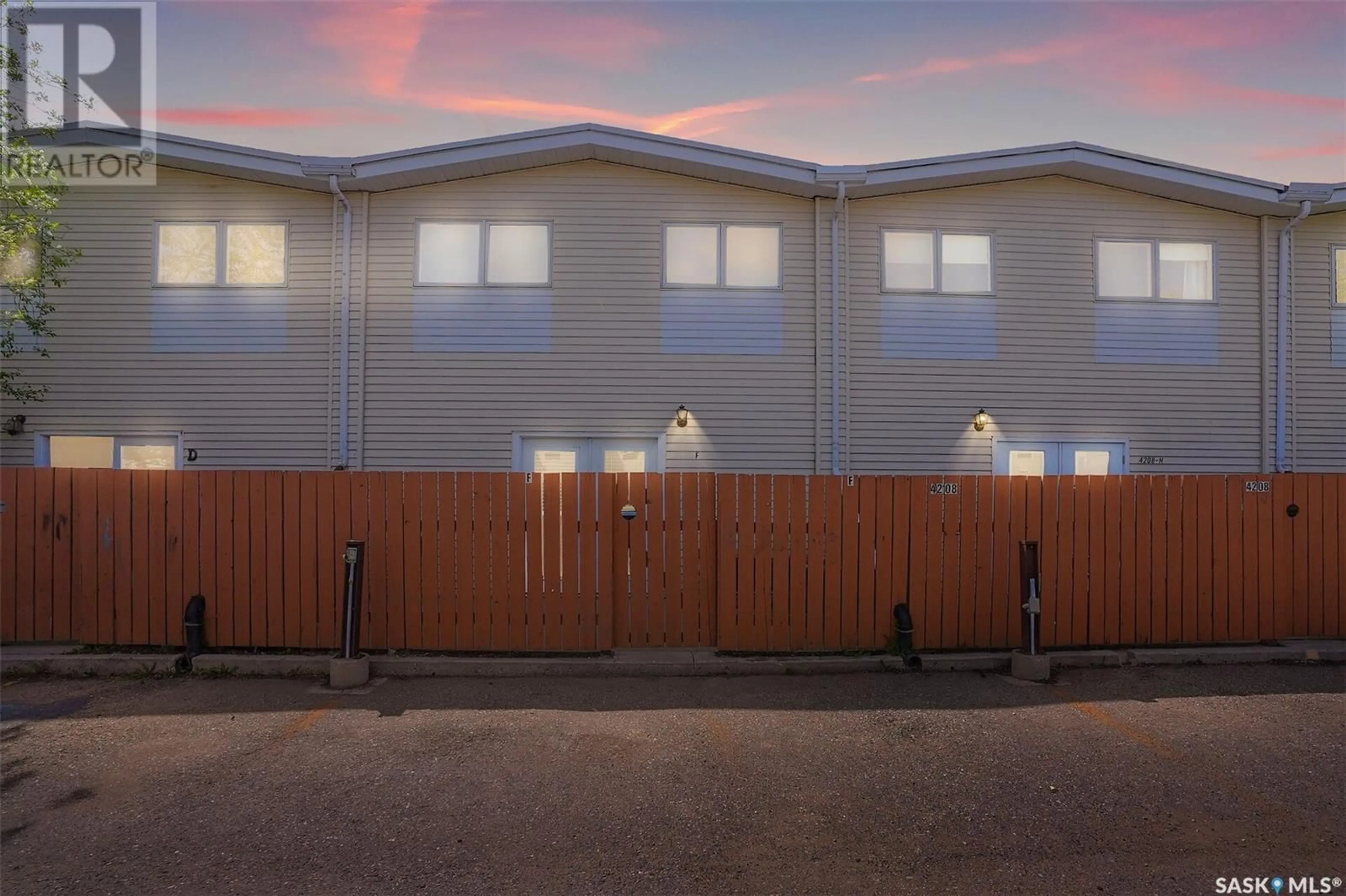 A pic from outside/outdoor area/front of a property/back of a property/a pic from drone, building for F - 4208 CASTLE ROAD, Regina Saskatchewan S4S4W1