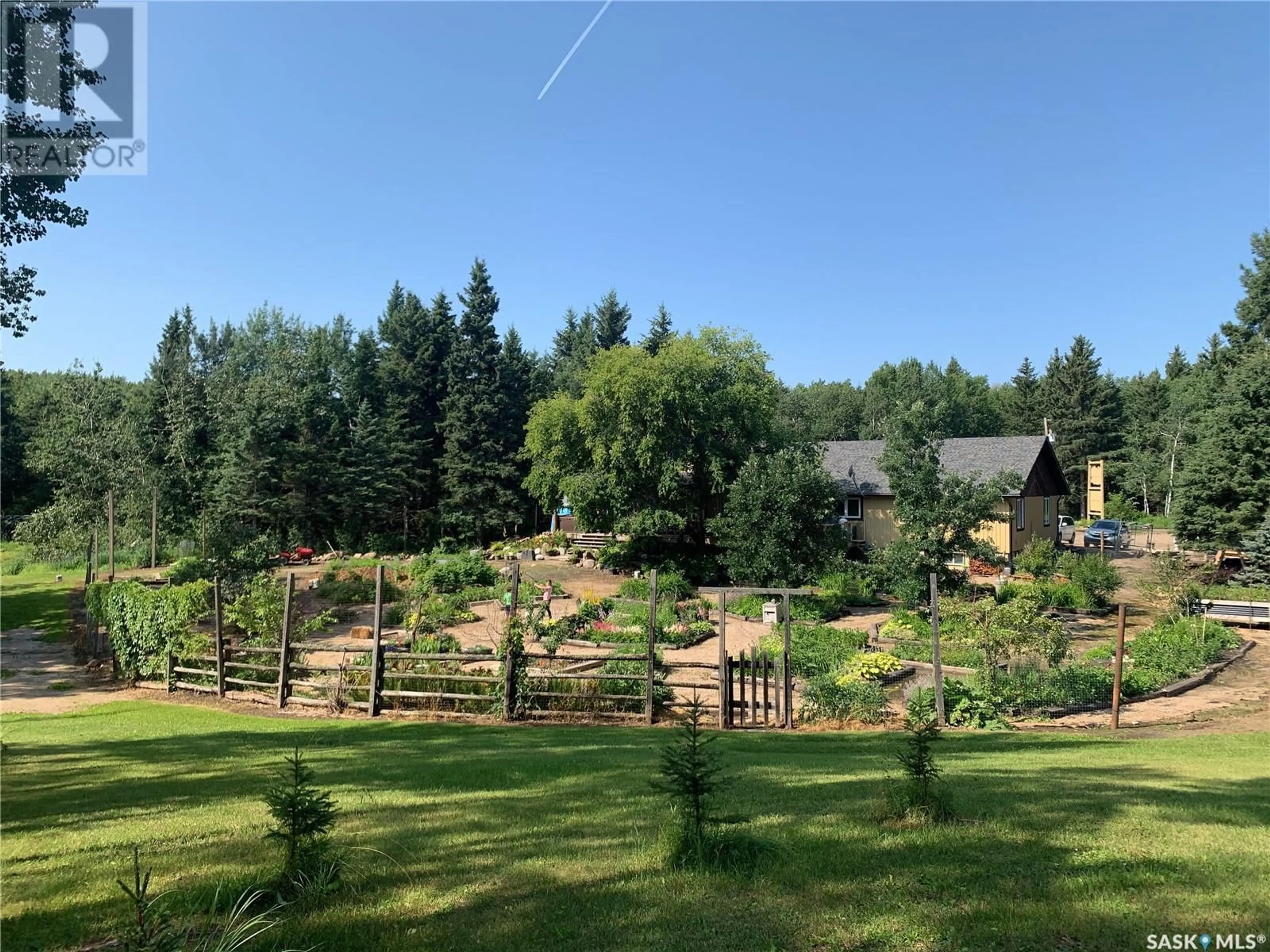 A pic from outside/outdoor area/front of a property/back of a property/a pic from drone, forest/trees view for EAGLES WINGS ACREAGE, Big River Rm No. 555 Saskatchewan S0J0E0