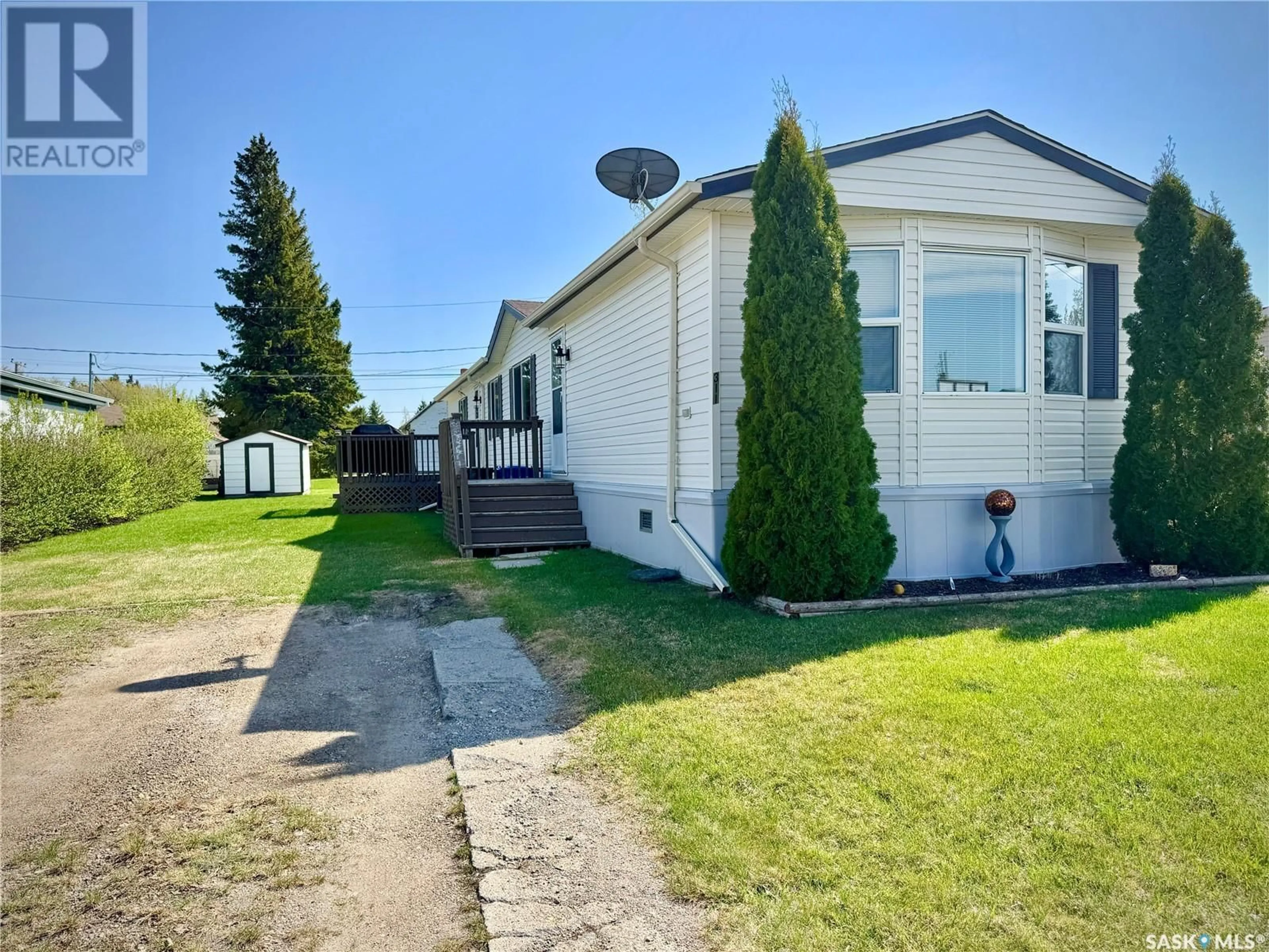 A pic from outside/outdoor area/front of a property/back of a property/a pic from drone, street for E - 311 RIEDEL AVENUE, Langenburg Saskatchewan S0A2A0