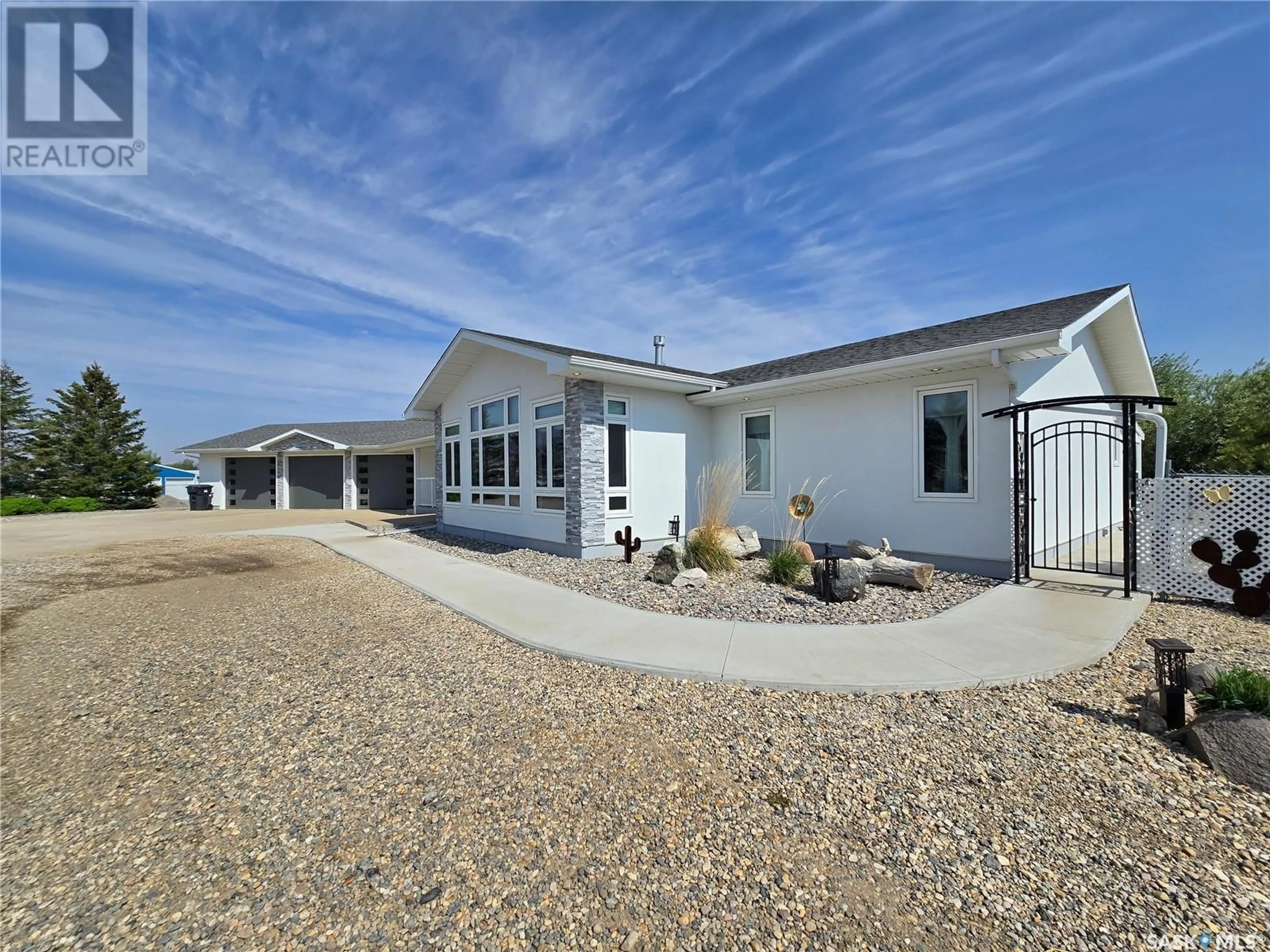 A pic from outside/outdoor area/front of a property/back of a property/a pic from drone, street for 915 COTEAU AVENUE, Weyburn Saskatchewan S4H2T9
