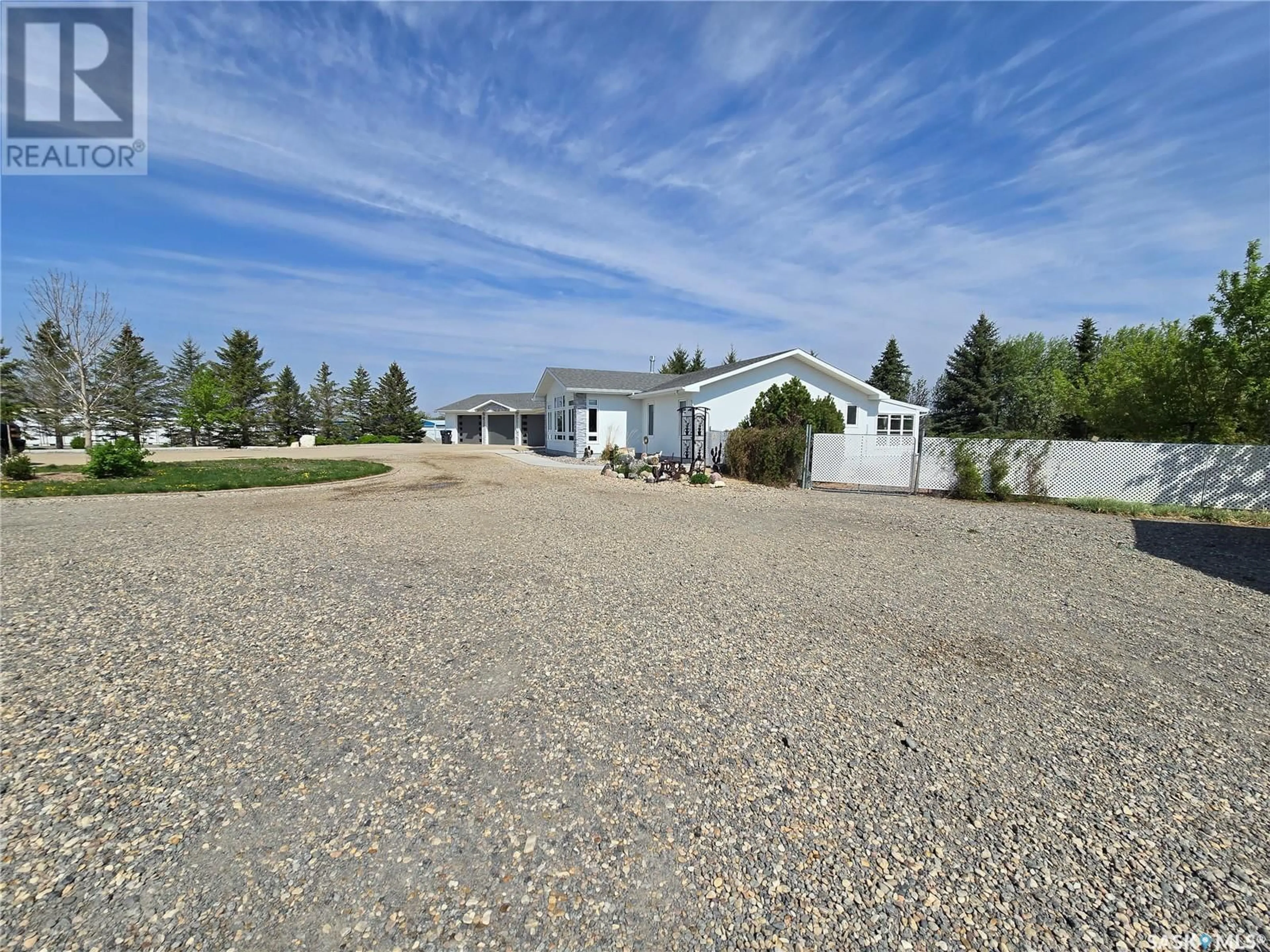 A pic from outside/outdoor area/front of a property/back of a property/a pic from drone, street for 915 COTEAU AVENUE, Weyburn Saskatchewan S4H2T9