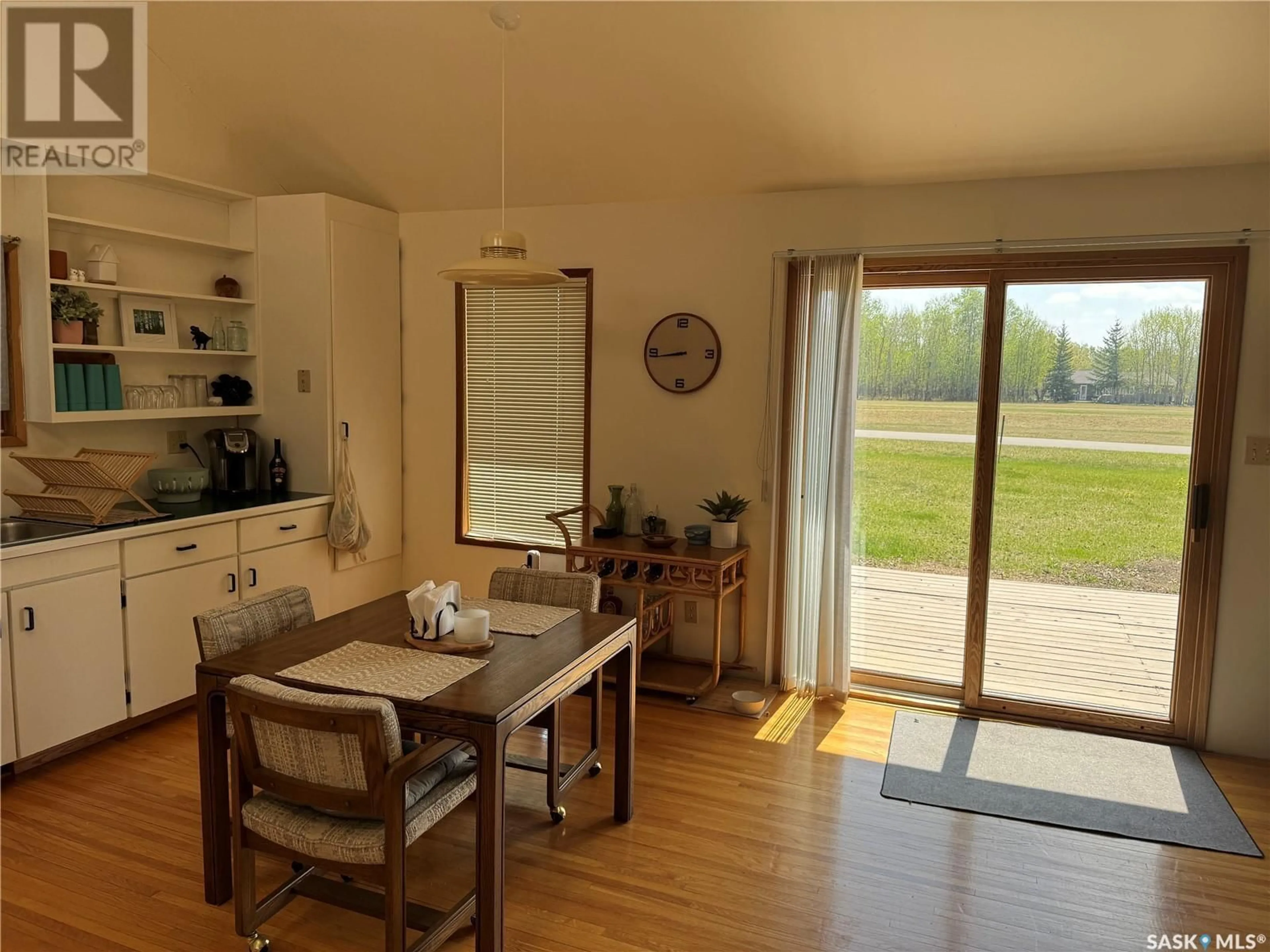 Dining room, wood/laminate floor for 133 PEBBLE BEACH ROAD, Good Spirit Acres Saskatchewan S0A0L1