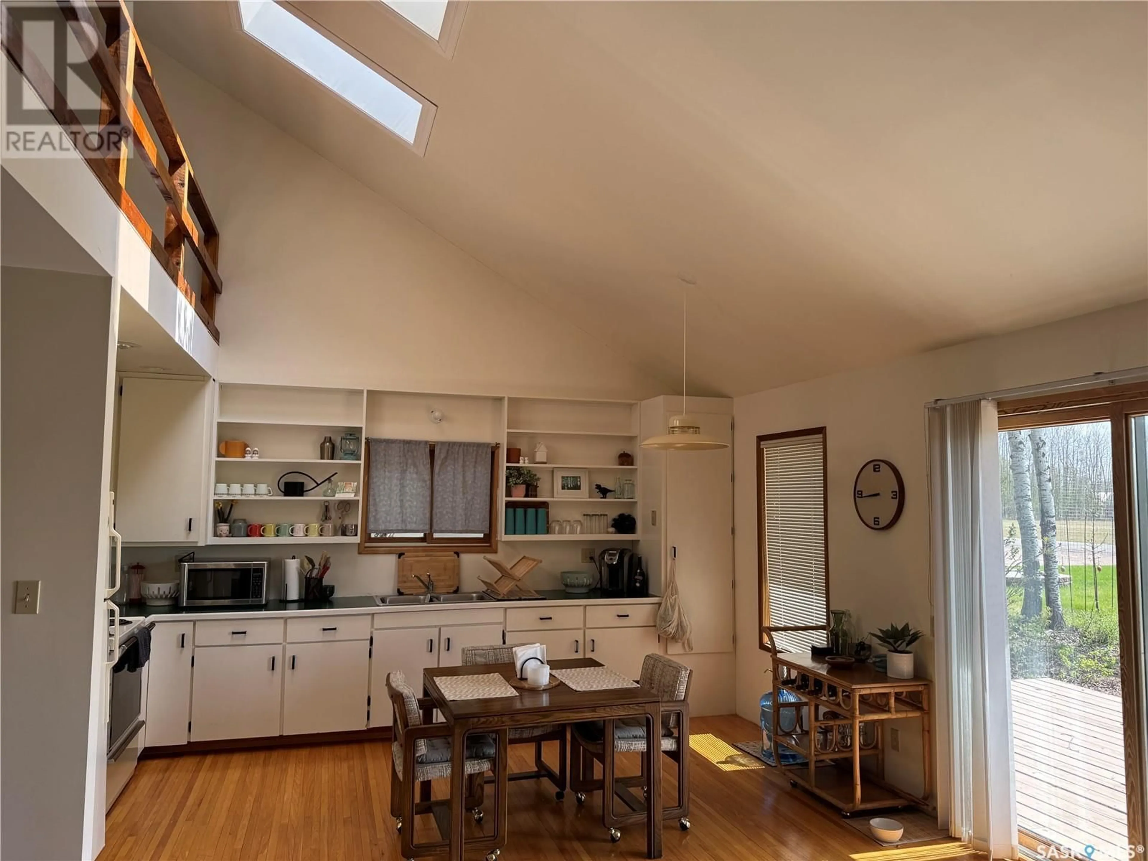 Open concept kitchen, wood/laminate floor for 133 PEBBLE BEACH ROAD, Good Spirit Acres Saskatchewan S0A0L1