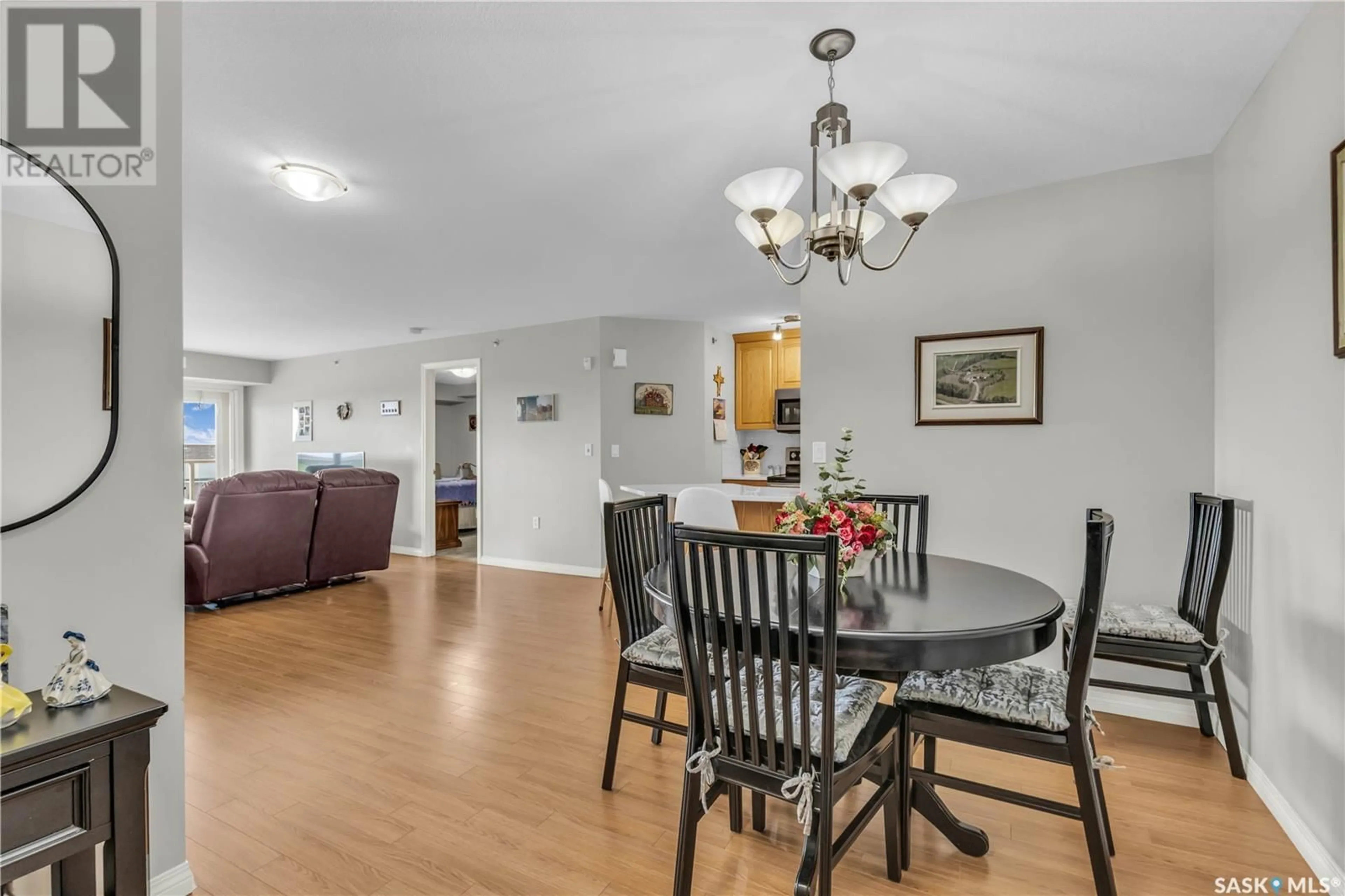 Dining room, wood/laminate floor for 2221 - 805 ADELAIDE STREET, Saskatoon Saskatchewan S7J5L9