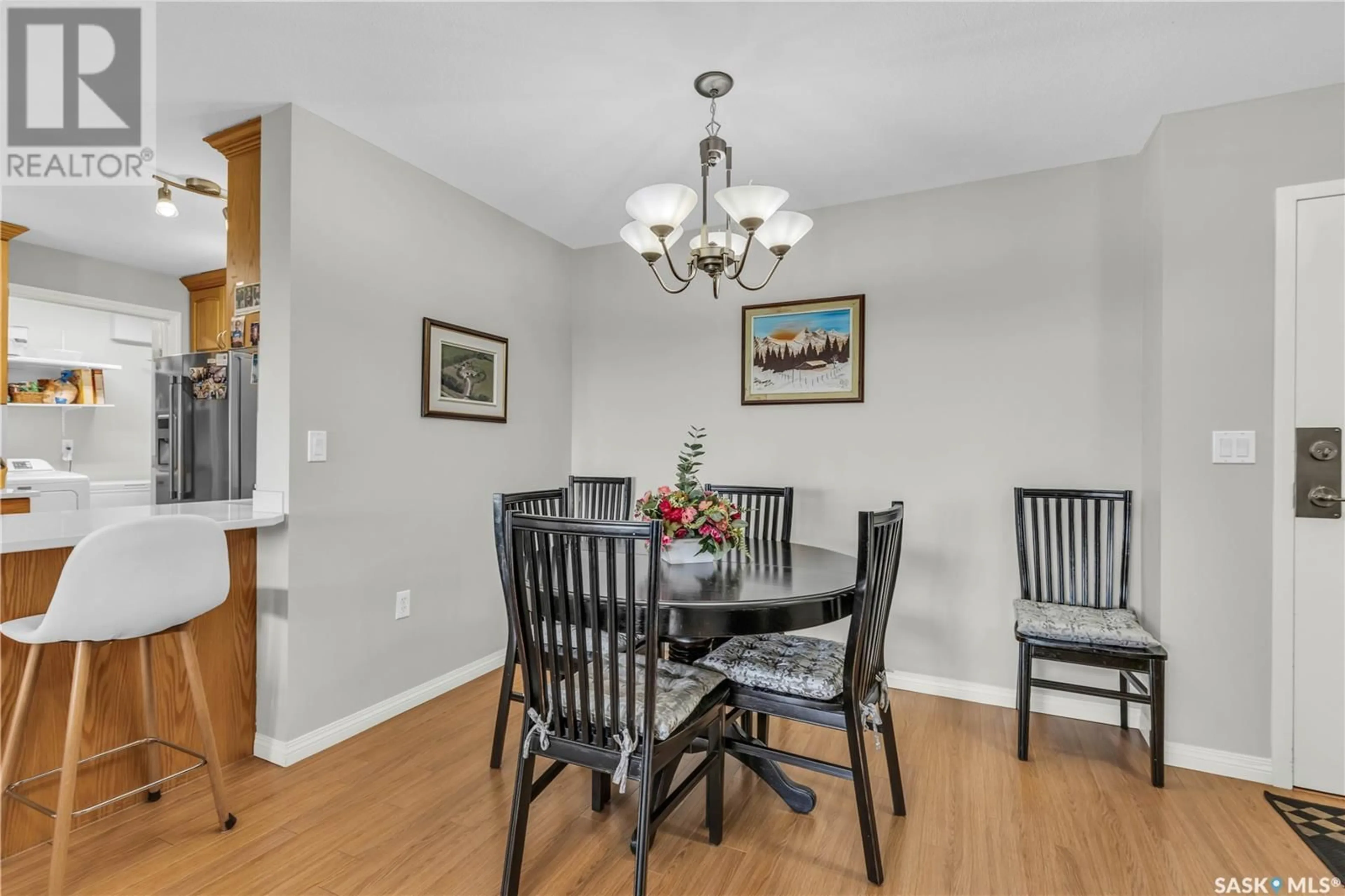 Dining room, wood/laminate floor for 2221 - 805 ADELAIDE STREET, Saskatoon Saskatchewan S7J5L9