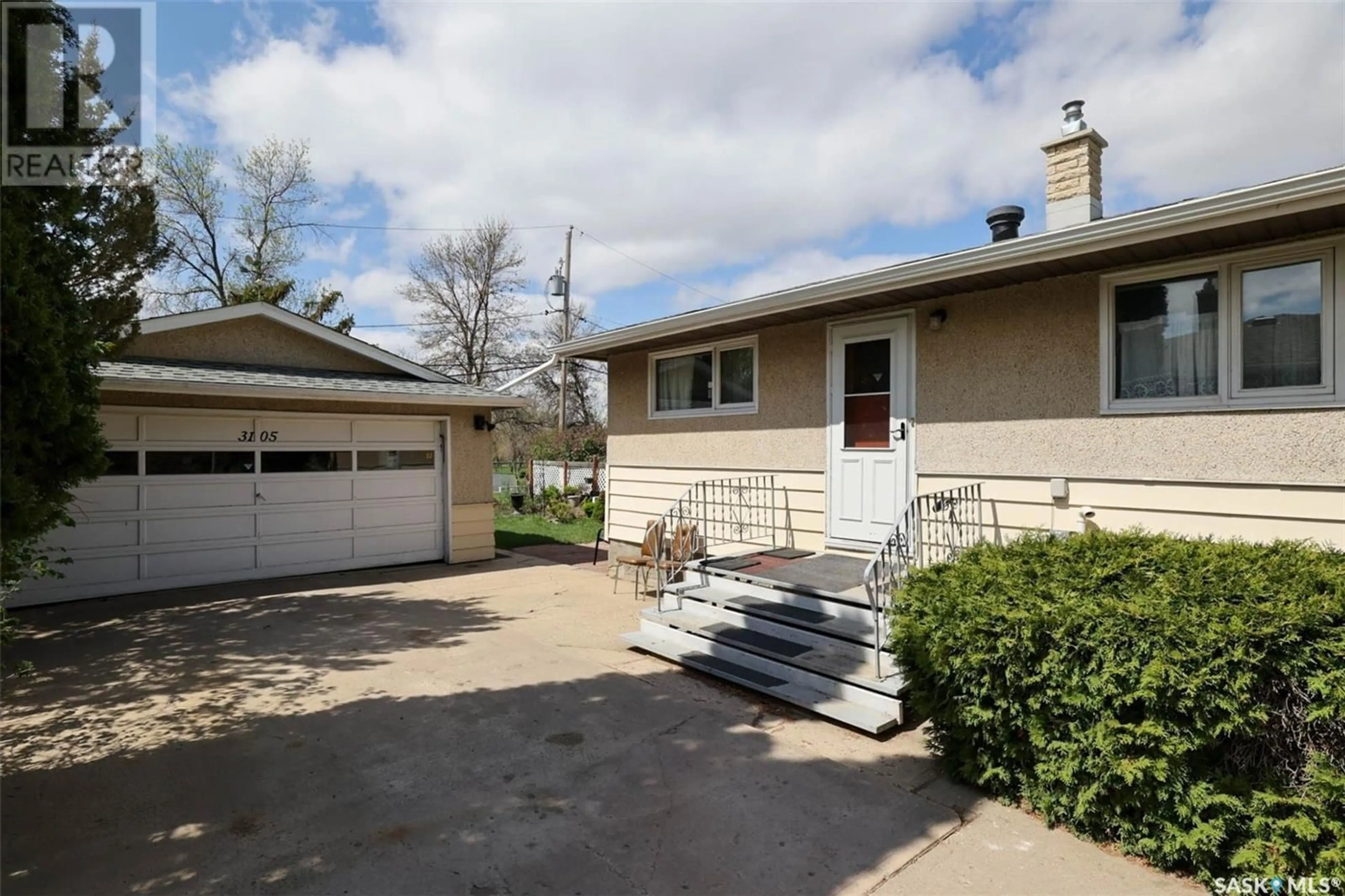 Home with vinyl exterior material, street for 3105 AVONHURST DRIVE, Regina Saskatchewan S4R3J6
