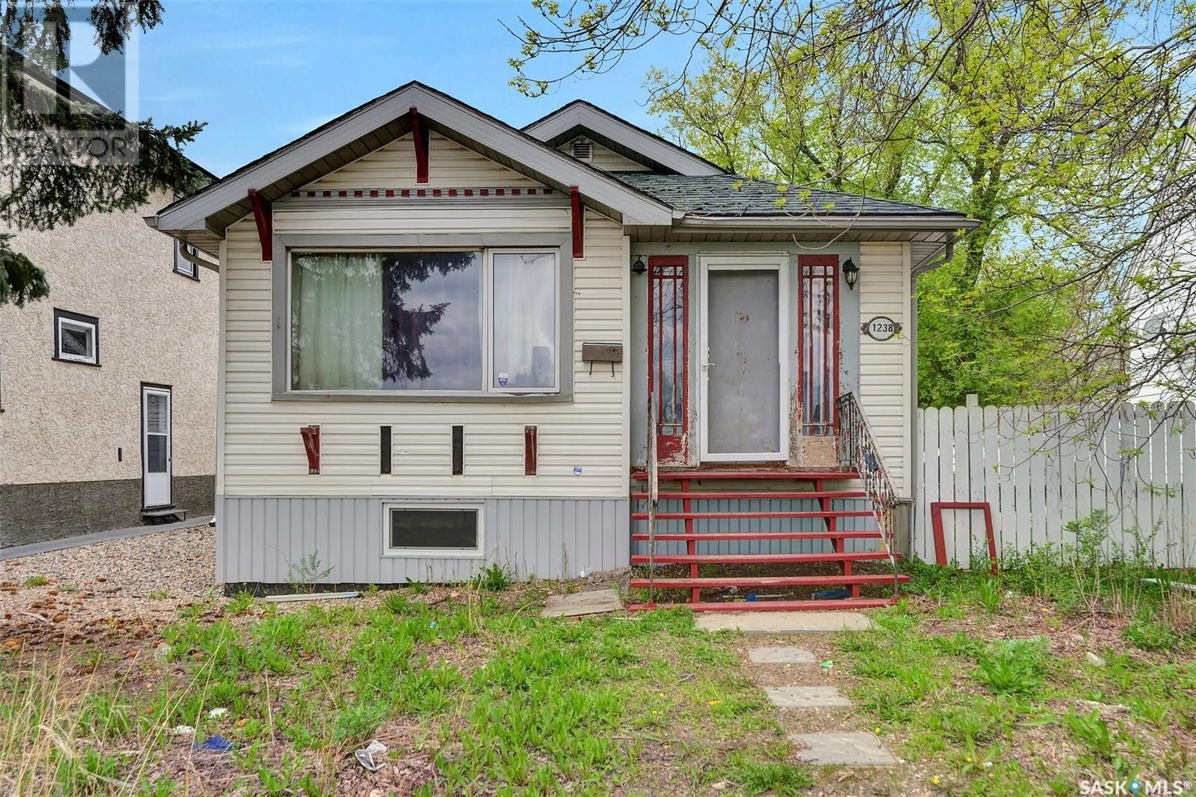 Home with vinyl exterior material, street for 1238 ELPHINSTONE STREET, Regina Saskatchewan S4T3M3