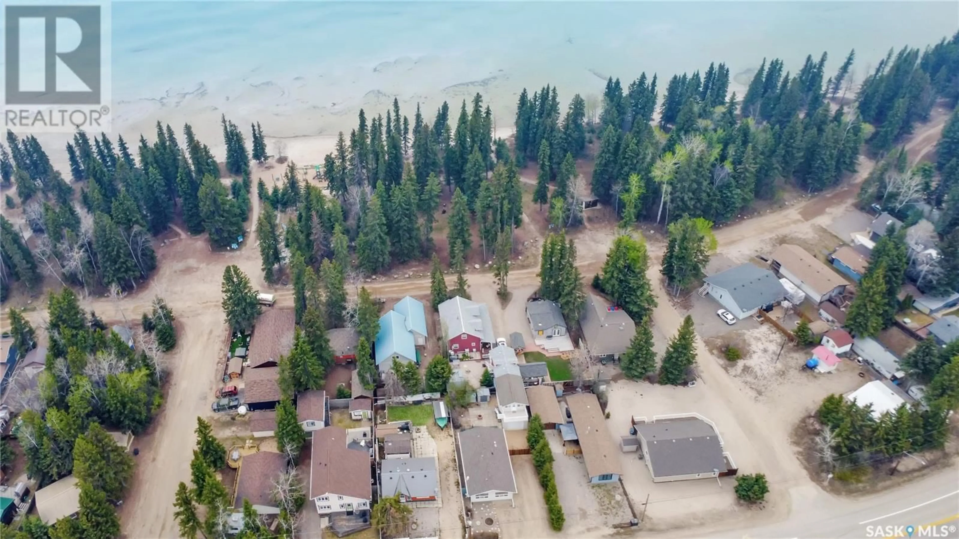 A pic from outside/outdoor area/front of a property/back of a property/a pic from drone, water/lake/river/ocean view for 67 MAIN STREET, Candle Lake Saskatchewan S0J3E0