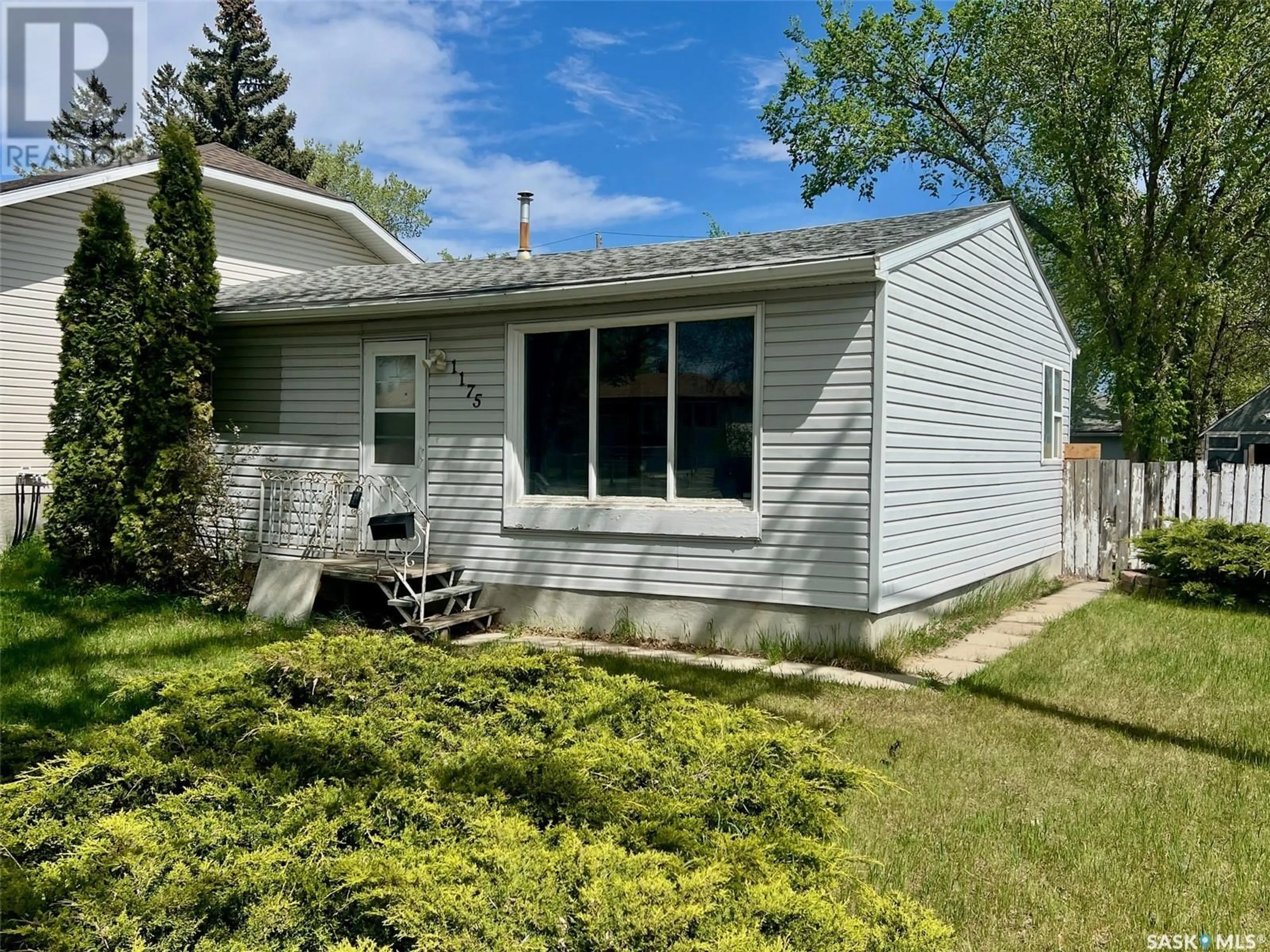 Home with vinyl exterior material, street for 1175 EDGAR STREET, Regina Saskatchewan S4N3J6