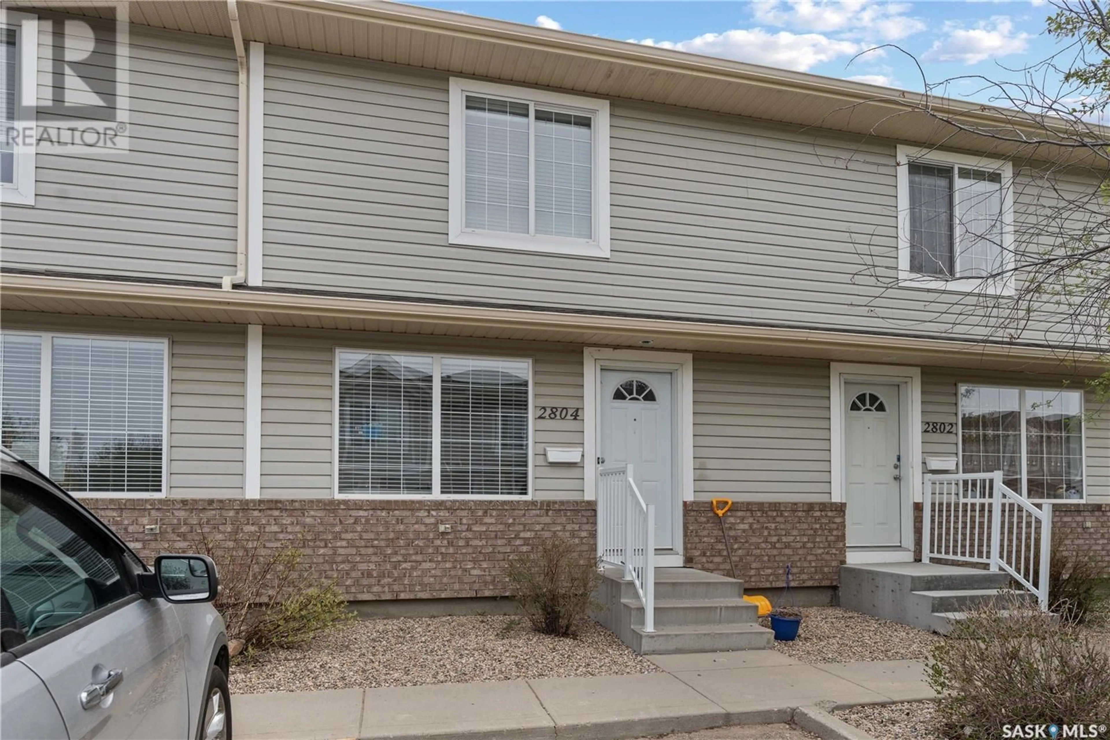 Home with vinyl exterior material, street for 2804 CRANBOURN CRESCENT, Regina Saskatchewan S4V3C1