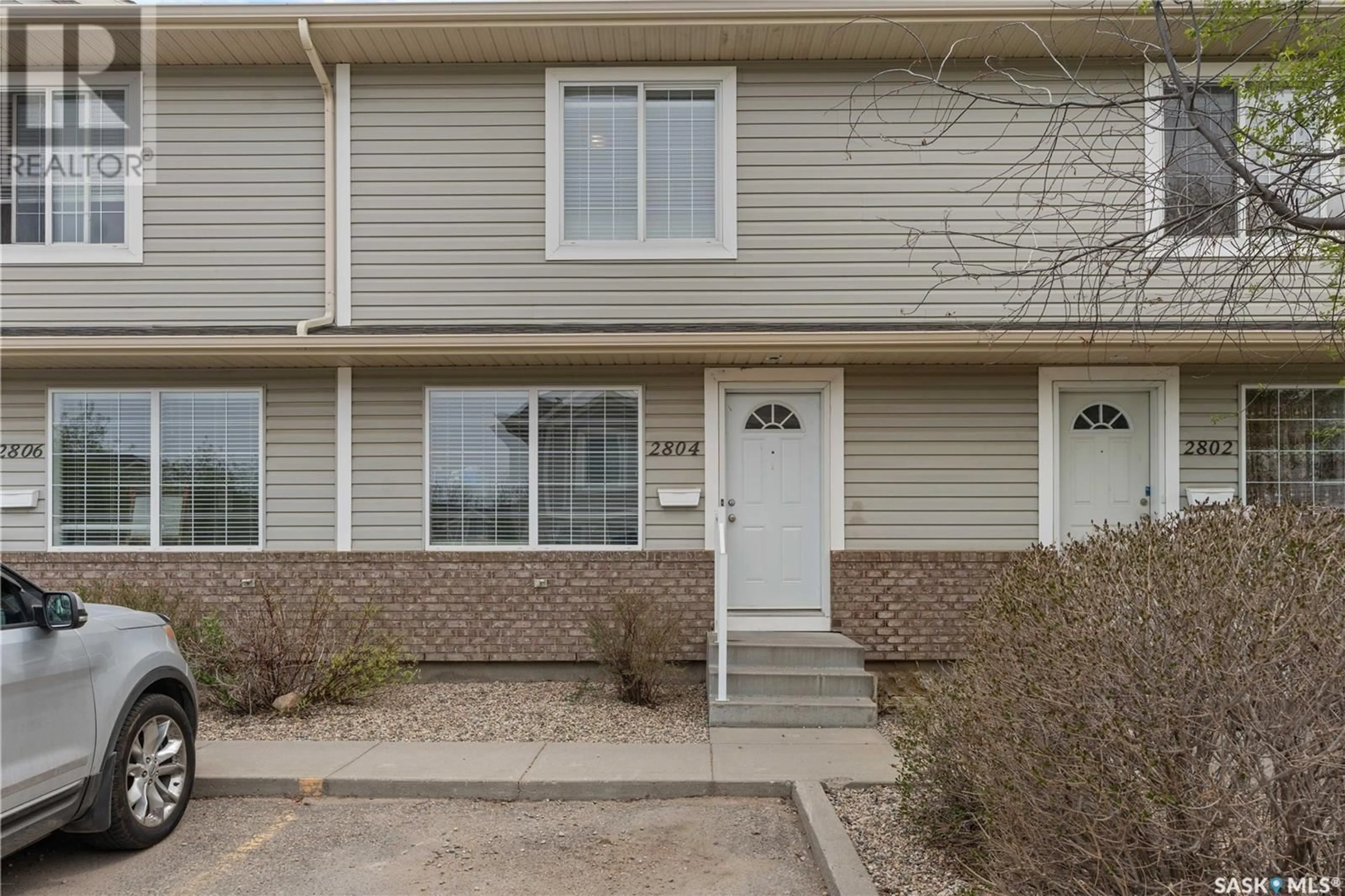 Home with vinyl exterior material, street for 2804 CRANBOURN CRESCENT, Regina Saskatchewan S4V3C1