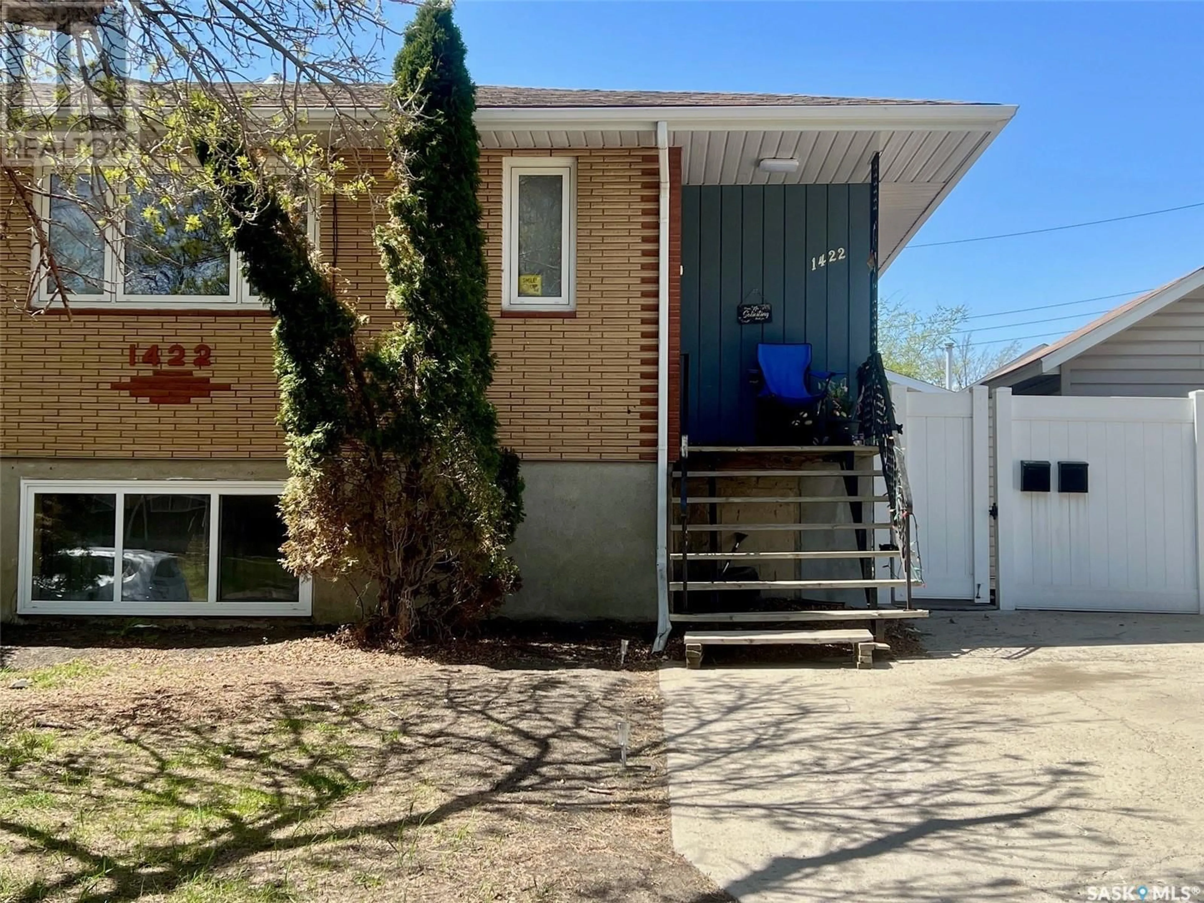 Home with vinyl exterior material, street for 1422 RUPERT STREET, Regina Saskatchewan S4N1V8