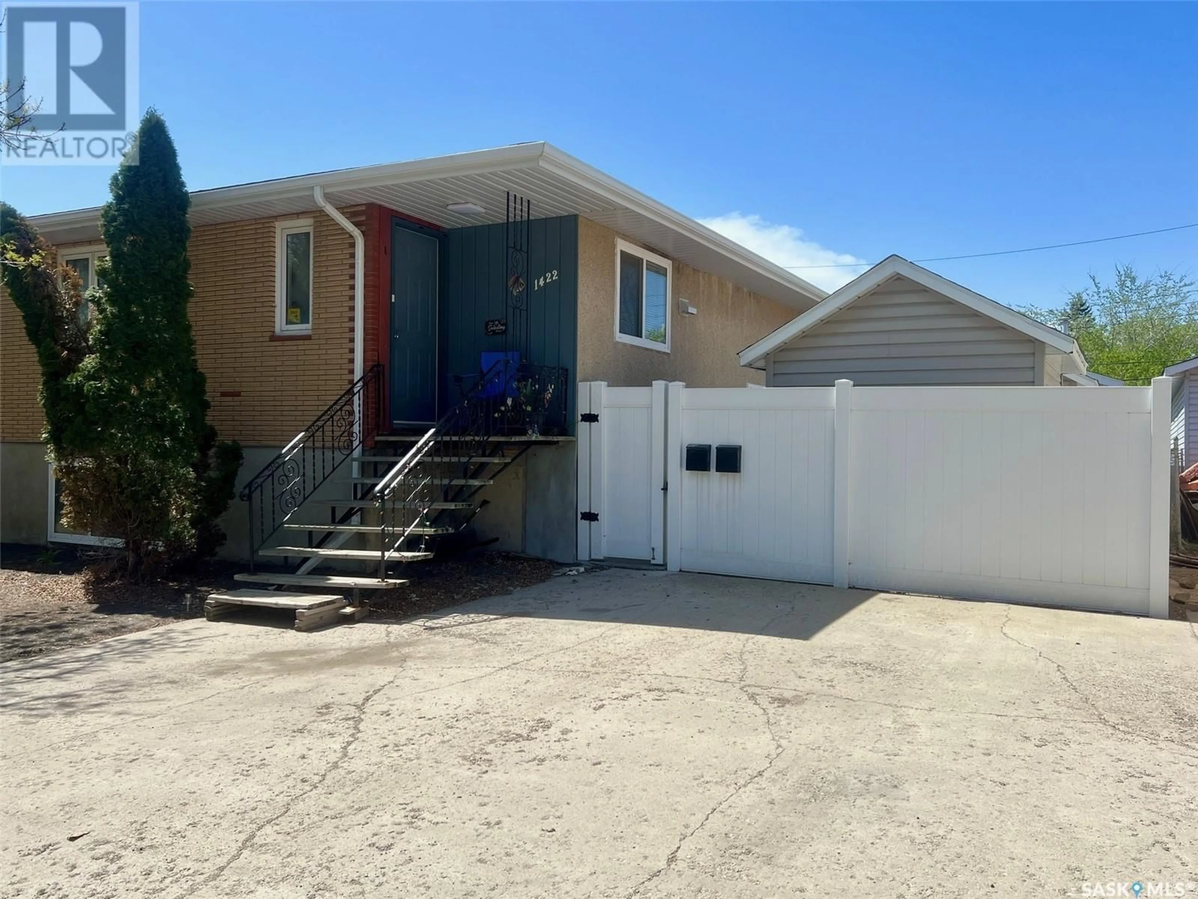 Home with vinyl exterior material, street for 1422 RUPERT STREET, Regina Saskatchewan S4N1V8