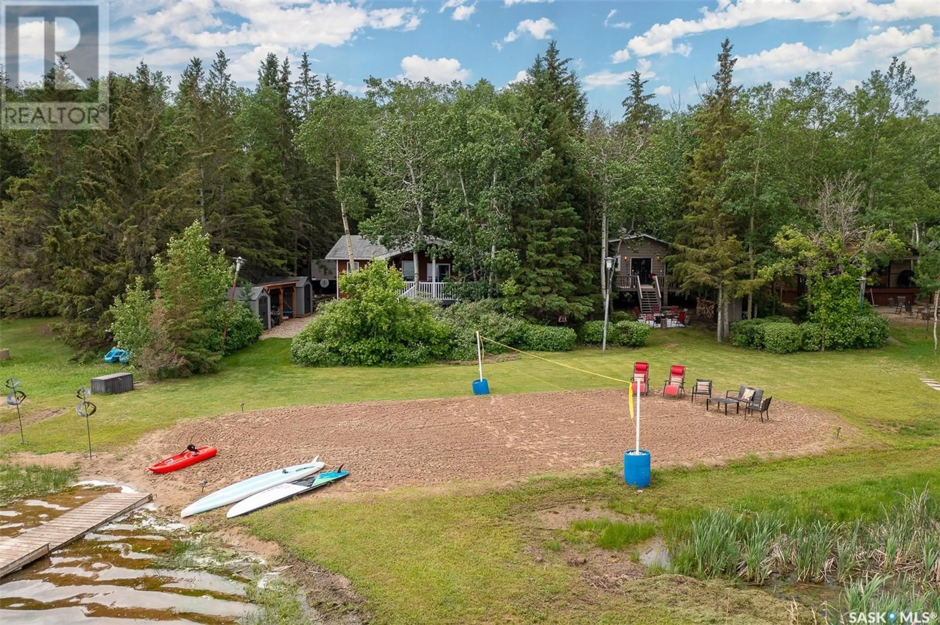 A pic from outside/outdoor area/front of a property/back of a property/a pic from drone, unknown for 31 SCHITKA BEACH, Wakaw Lake Saskatchewan S0K4P0
