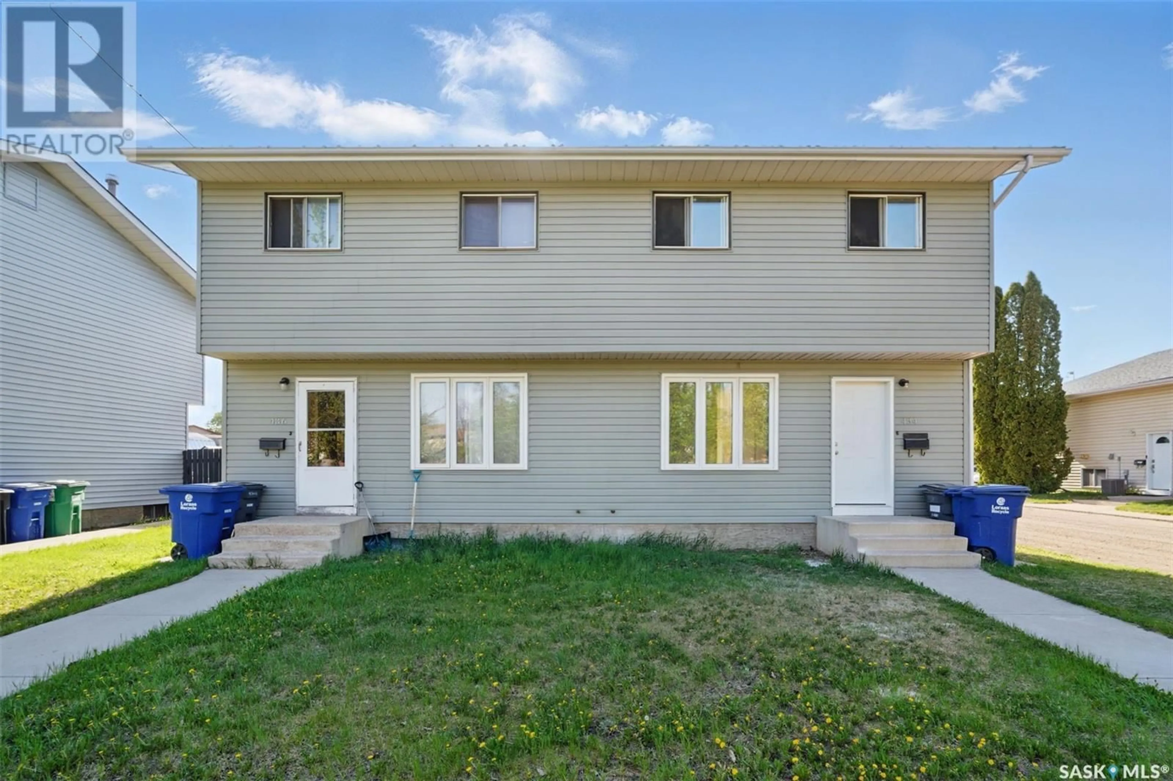 Home with vinyl exterior material, street for 434 & 436 BERINI DRIVE, Saskatoon Saskatchewan S7N3N5