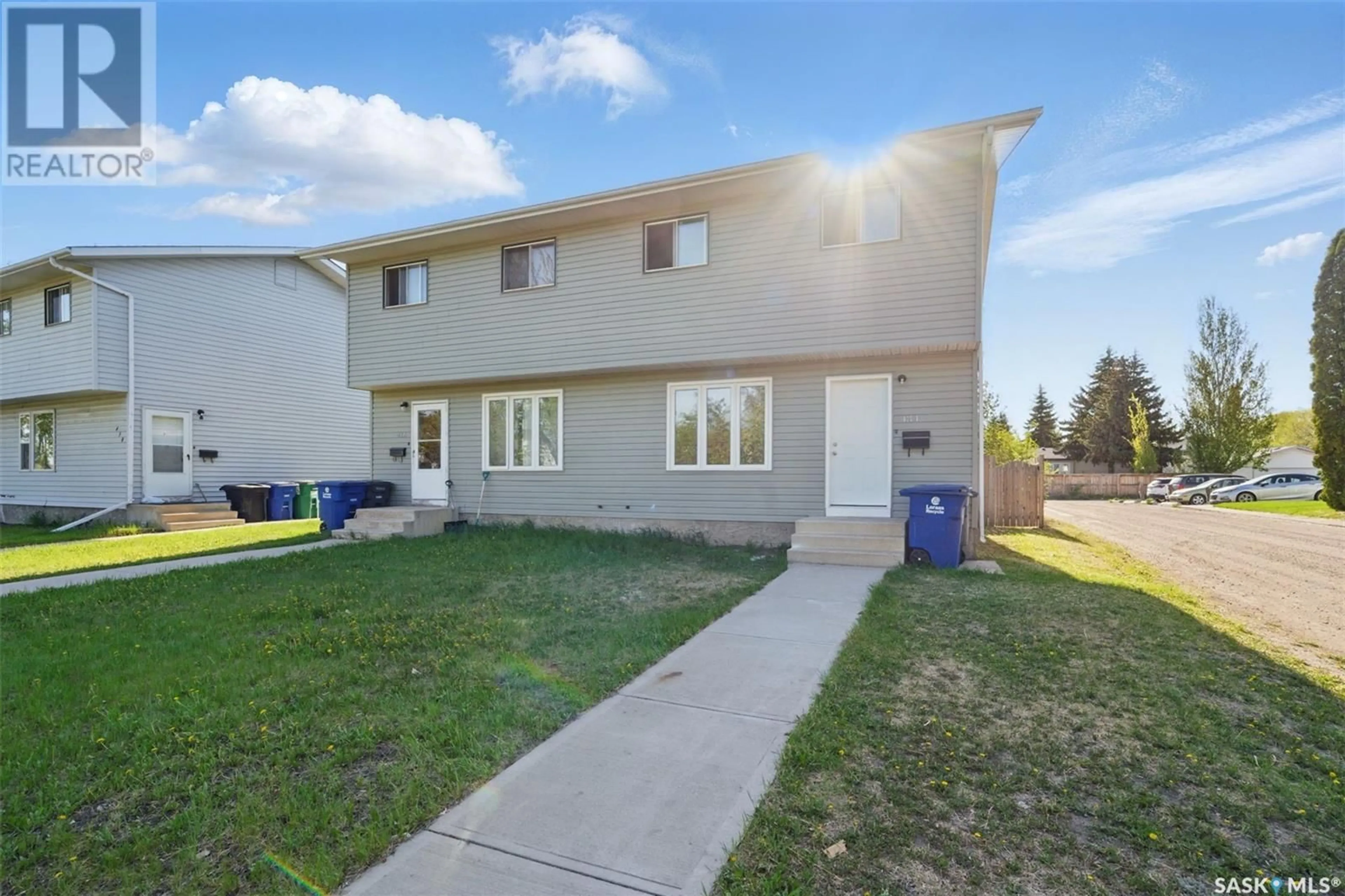 A pic from outside/outdoor area/front of a property/back of a property/a pic from drone, street for 434 & 436 BERINI DRIVE, Saskatoon Saskatchewan S7N3N5